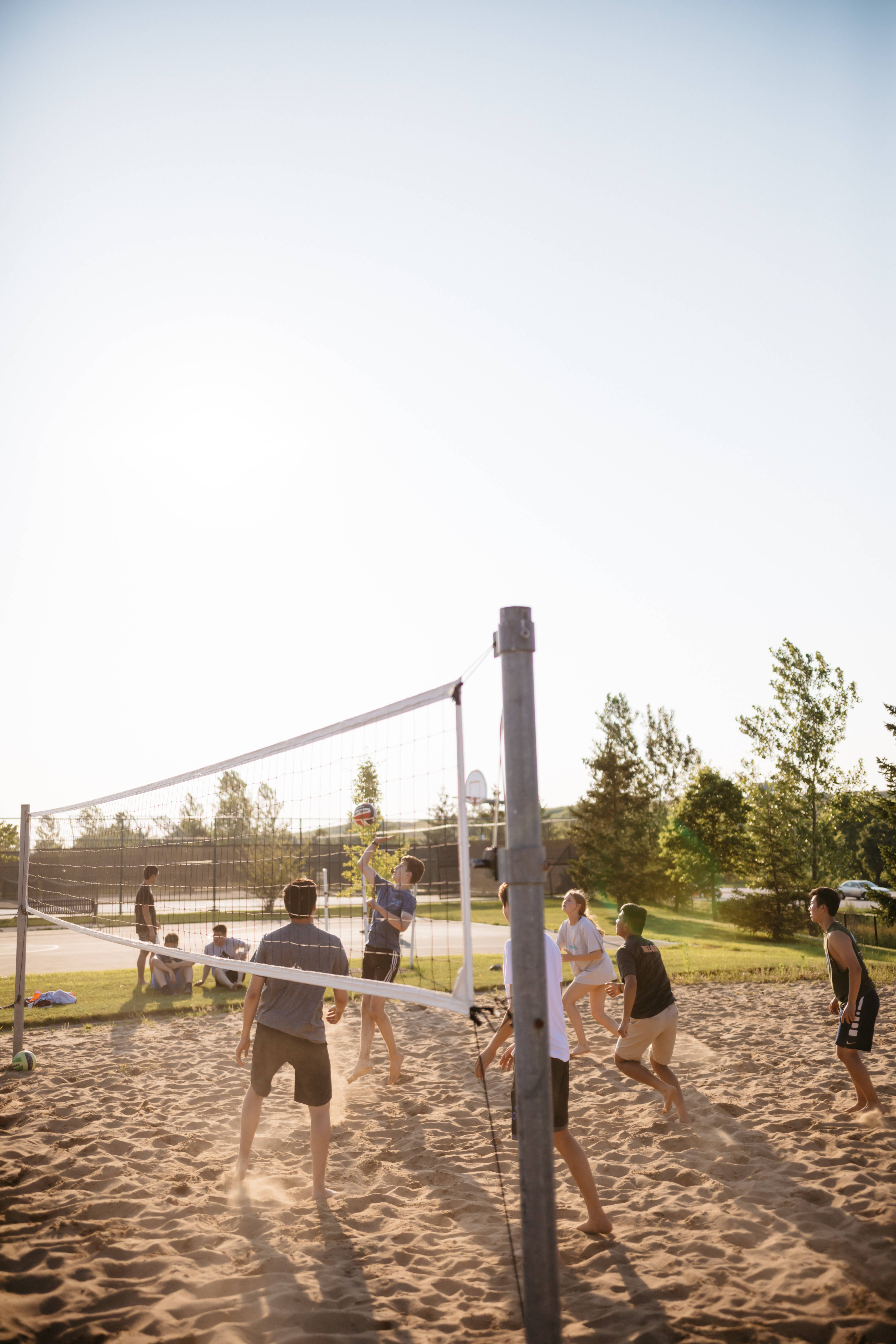 artificial sand beach, golden sunset, sandy court, 5K Phone Wallpaper