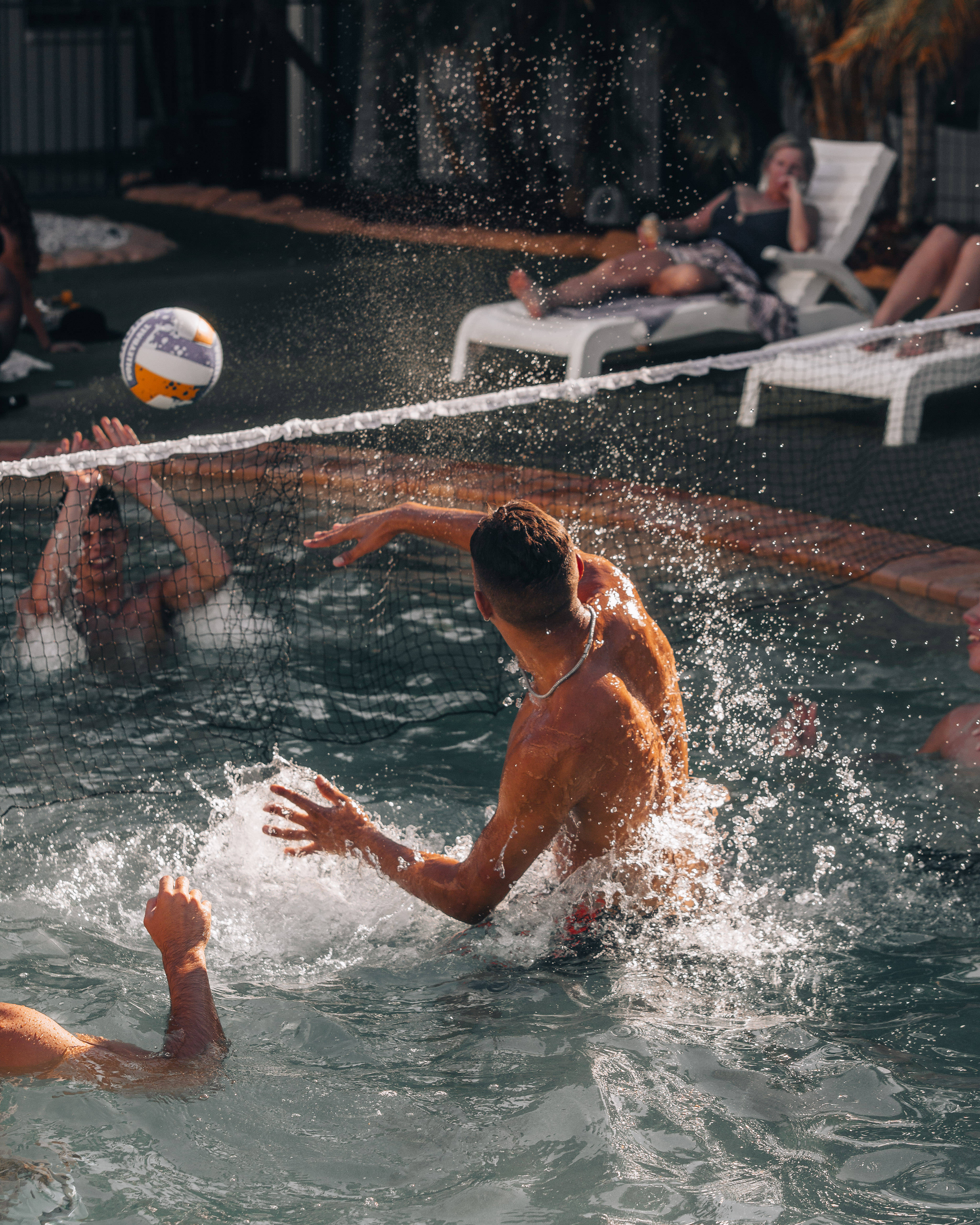 Volleyball, pool, lounge chairs, 4K Phone Wallpaper