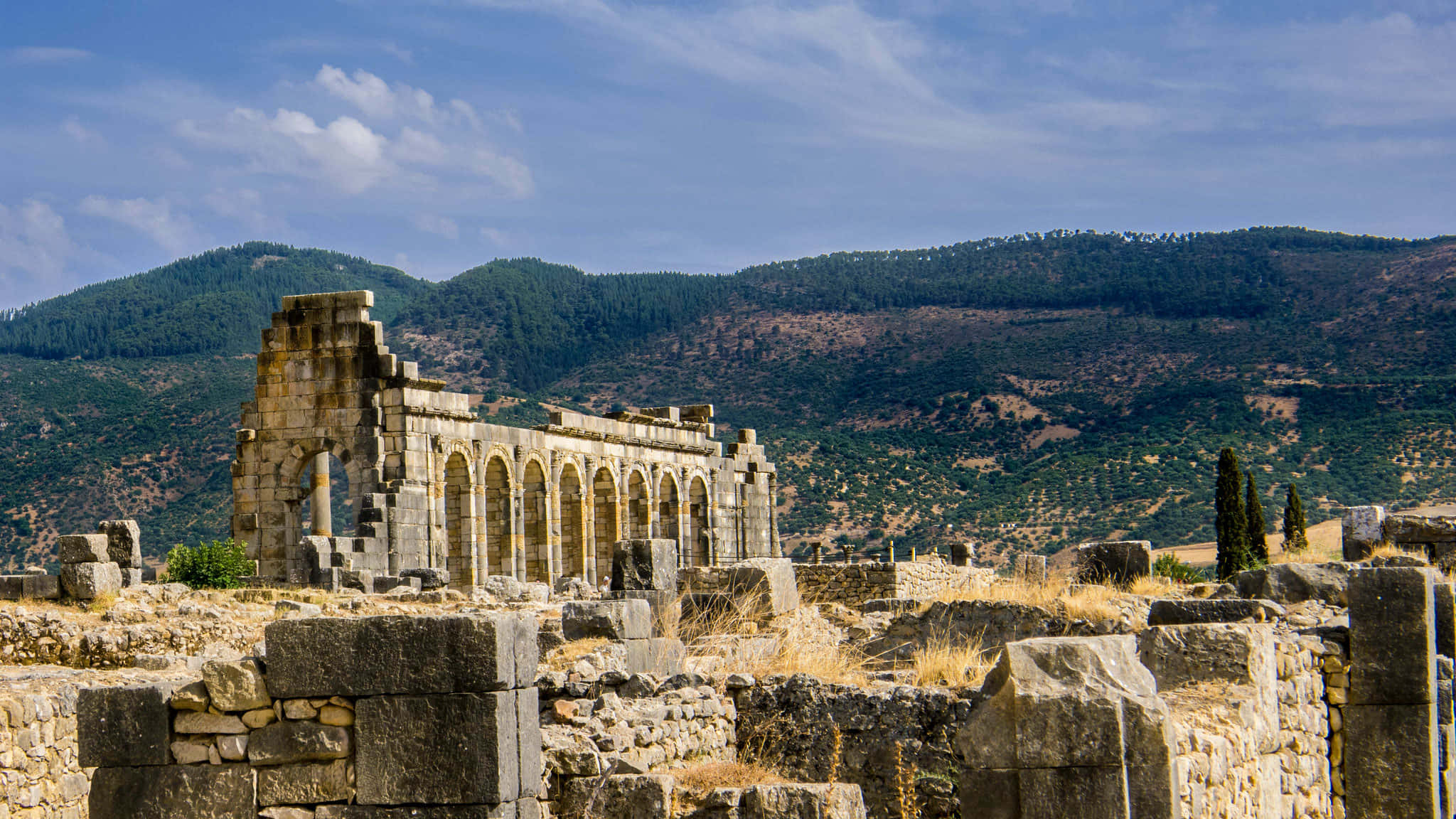Volubilis, ancient stone ruins, arched colonnades, Full HD Desktop Wallpaper