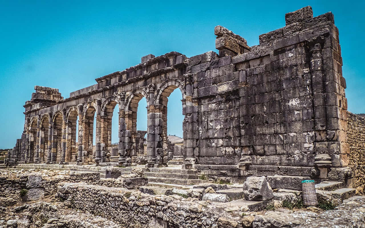 Volubilis, clear blue sky, arched colonnades, HD Desktop Wallpaper