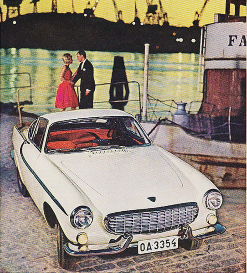 Volvo P1800, white sports car, cobblestone dock, SD Phone Wallpaper