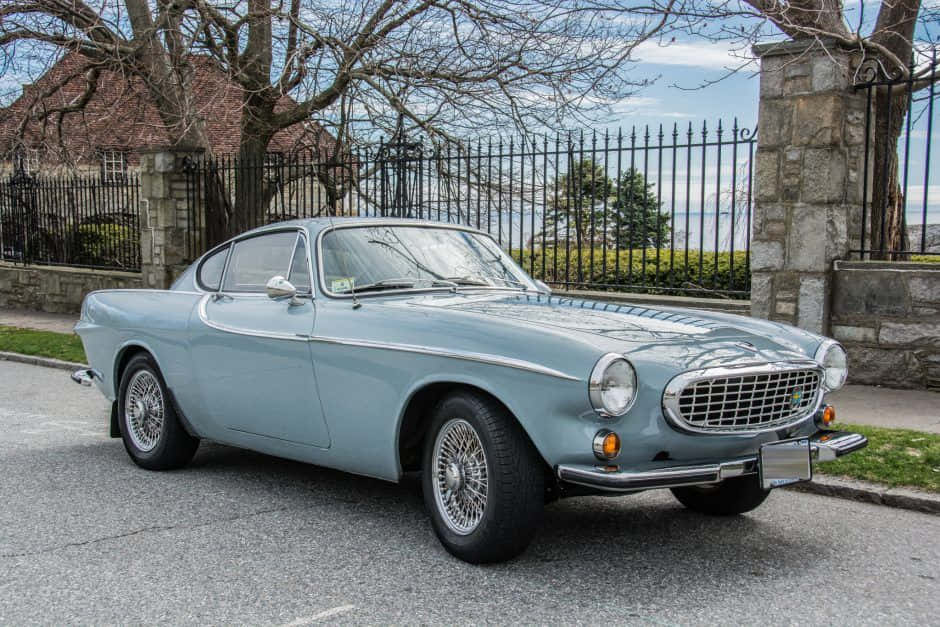 Volvo P1800, light blue, paved road, SD Desktop Wallpaper