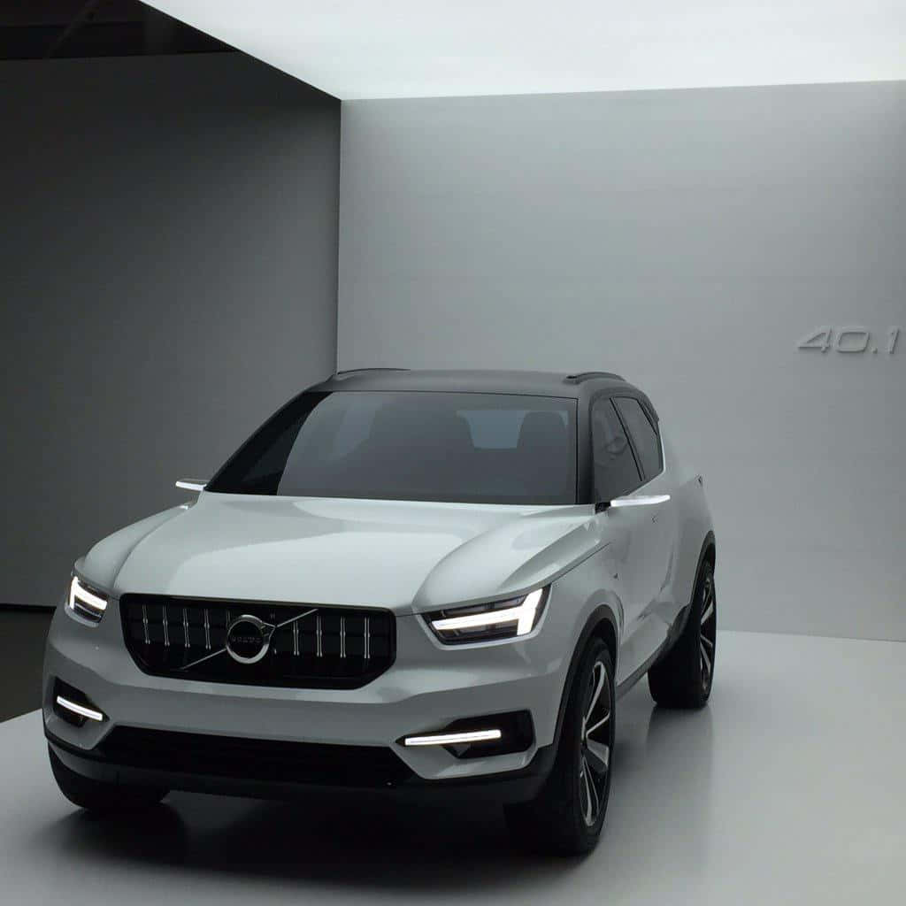 Volvo XC40, sleek silver, glowing headlights, SD Desktop Wallpaper