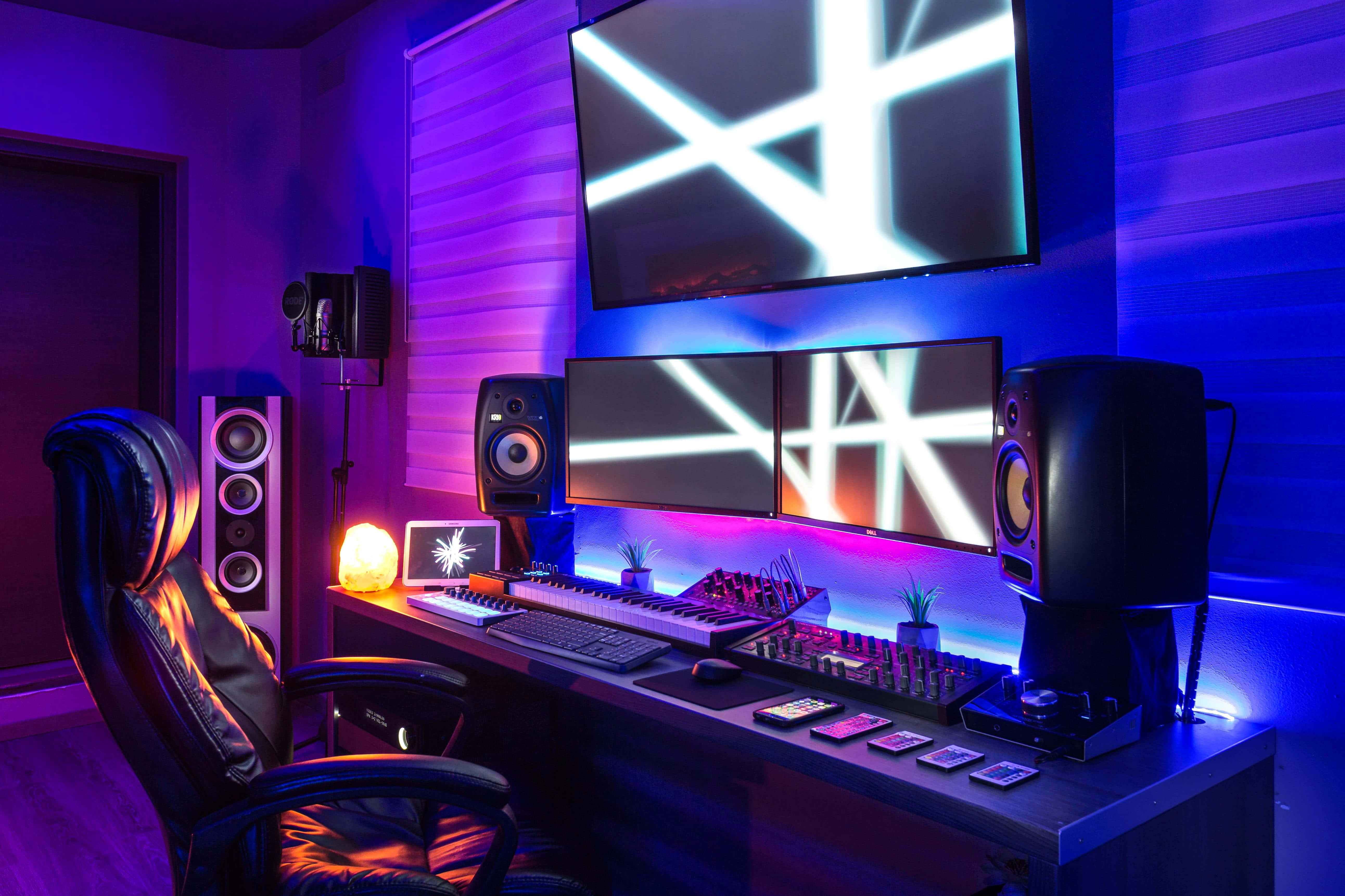 gaming PC setup, vibrant purple and blue neon light, multiple monitors, 5K Desktop Wallpaper