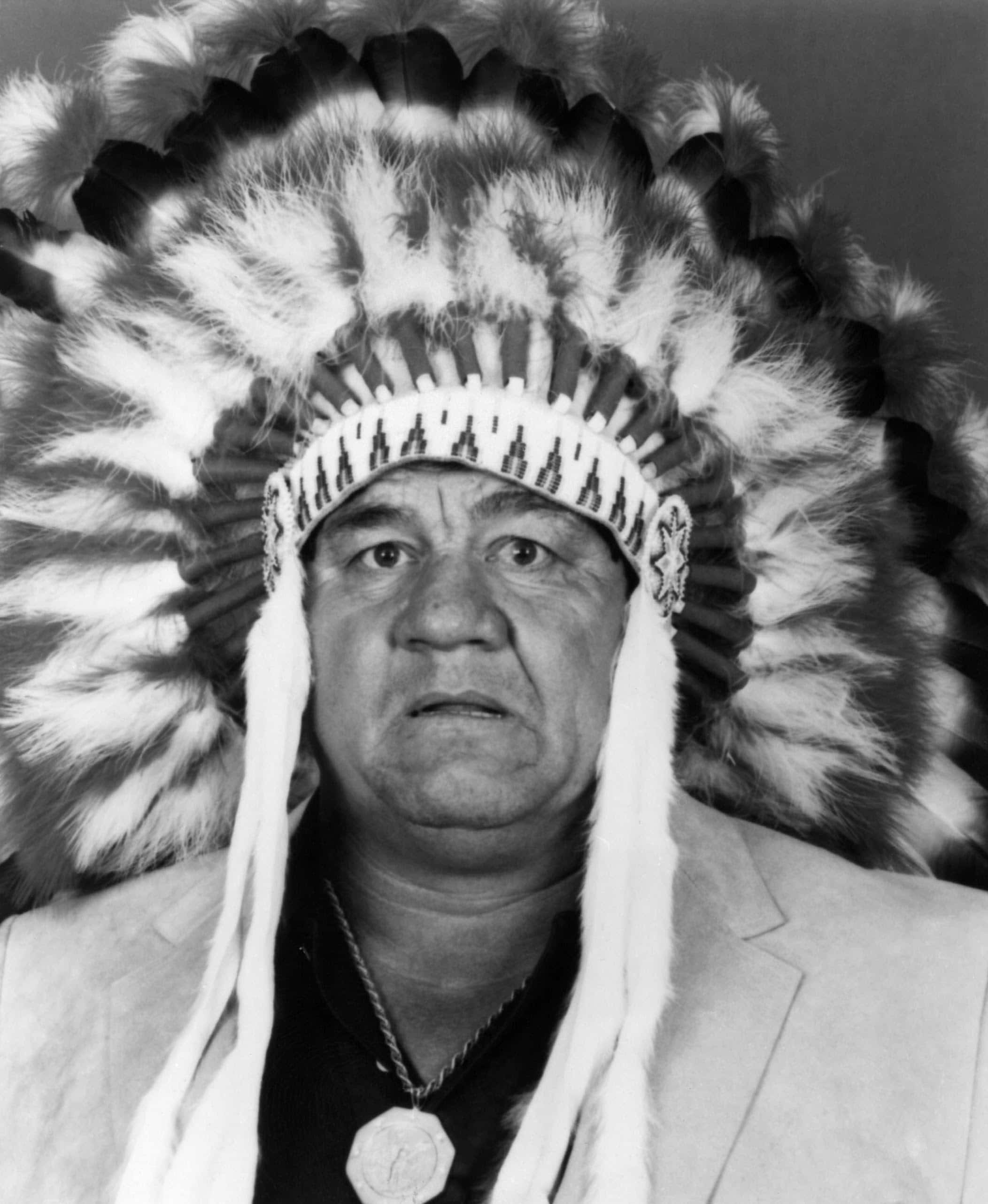 Wahoo McDaniel, feathered headdress, black and white portrait, 2K Phone Wallpaper