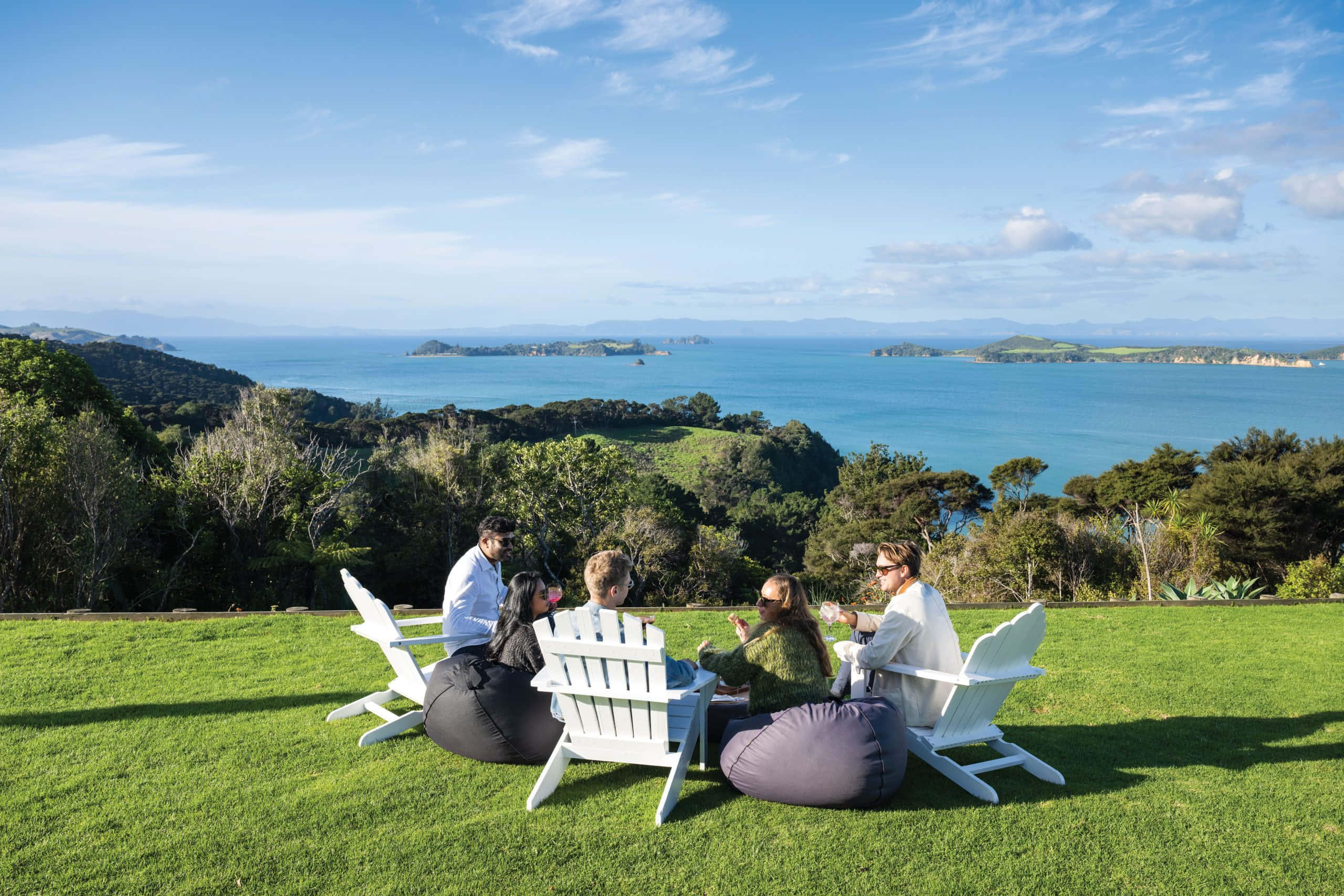 Waiheke Island, turquoise bay, sunlit grassy hill, 2K Desktop Wallpaper