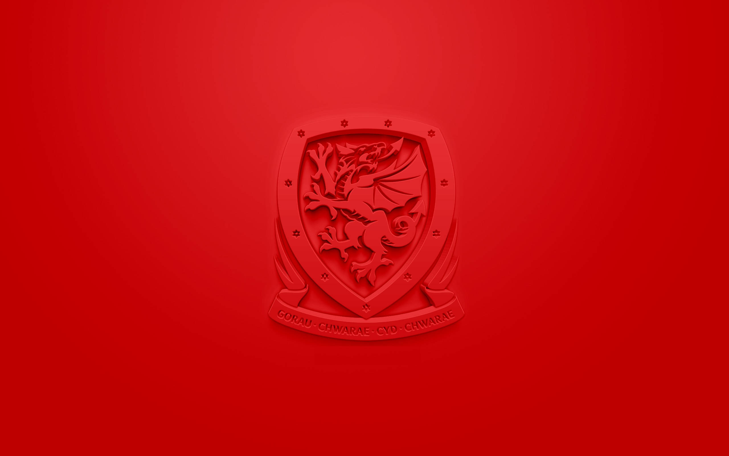 Wales National Football Team, red Welsh dragon crest, solid red background, 2K Desktop Wallpaper