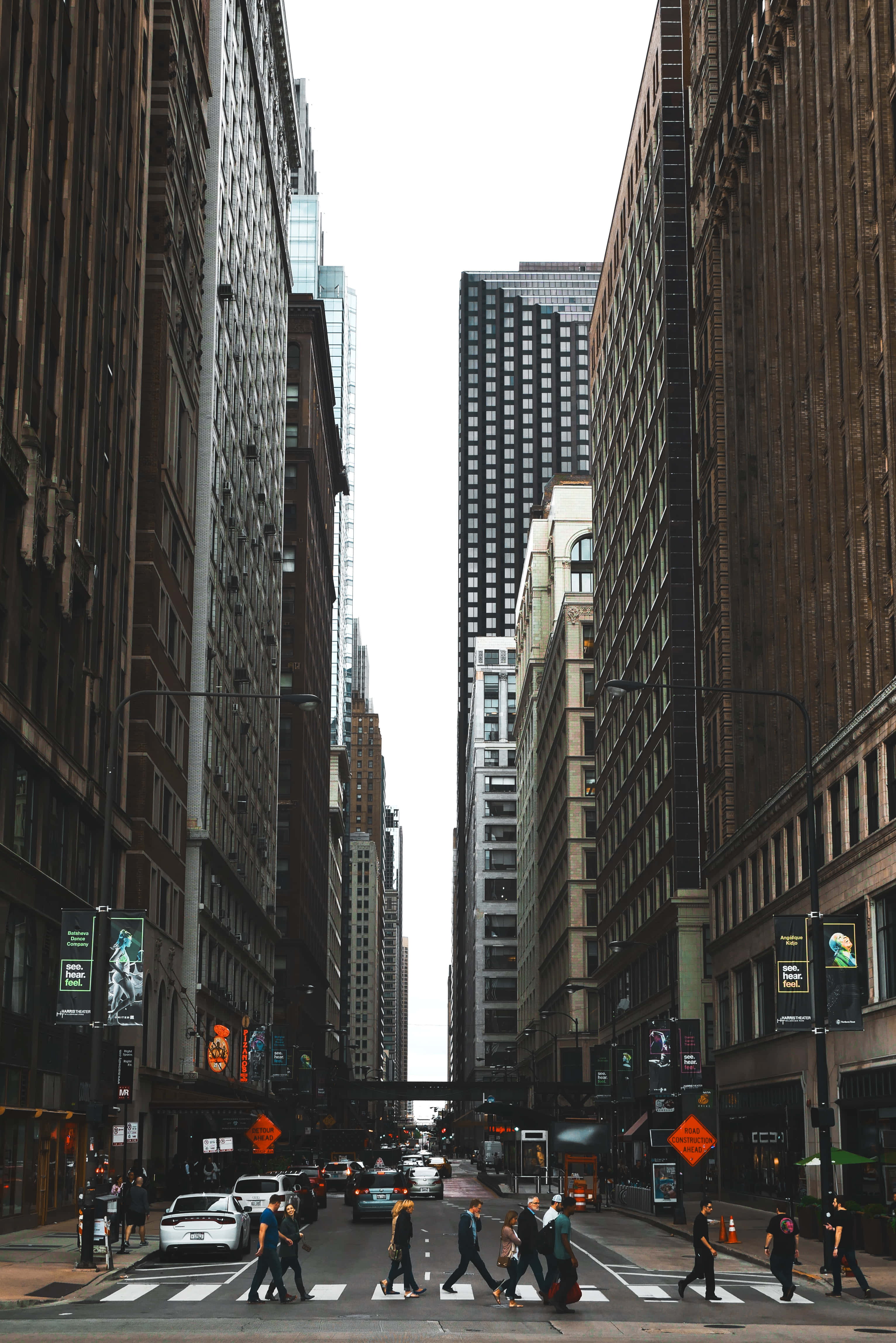 Wall Street, brick and glass skyscrapers, bustling city street, 4K Phone Wallpaper
