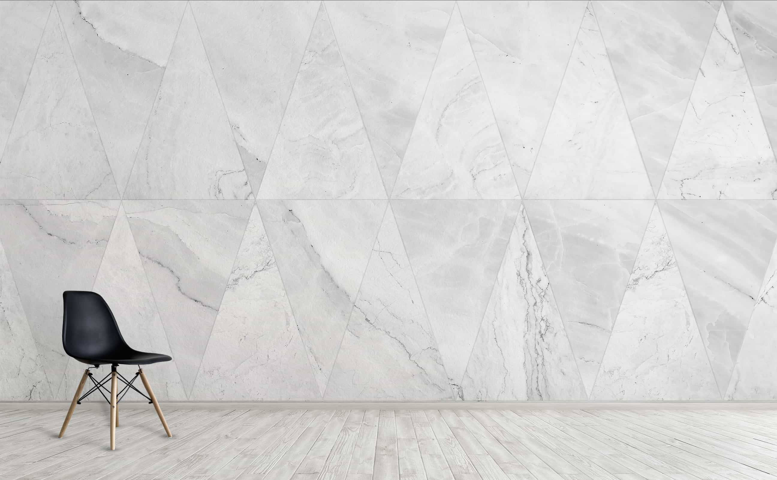 white marble wall, sleek black chair, wooden legs, 2K Desktop Wallpaper