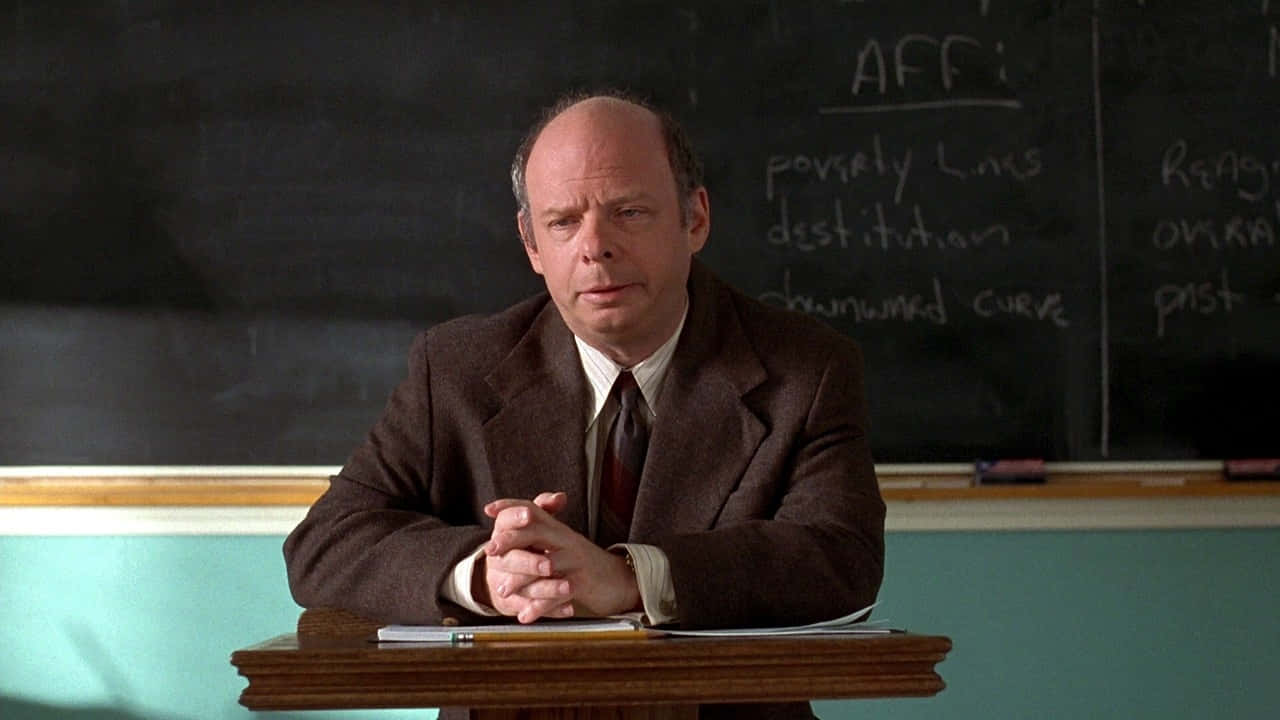 Wallace Shawn, brown suit, wooden desk, HD Desktop Wallpaper