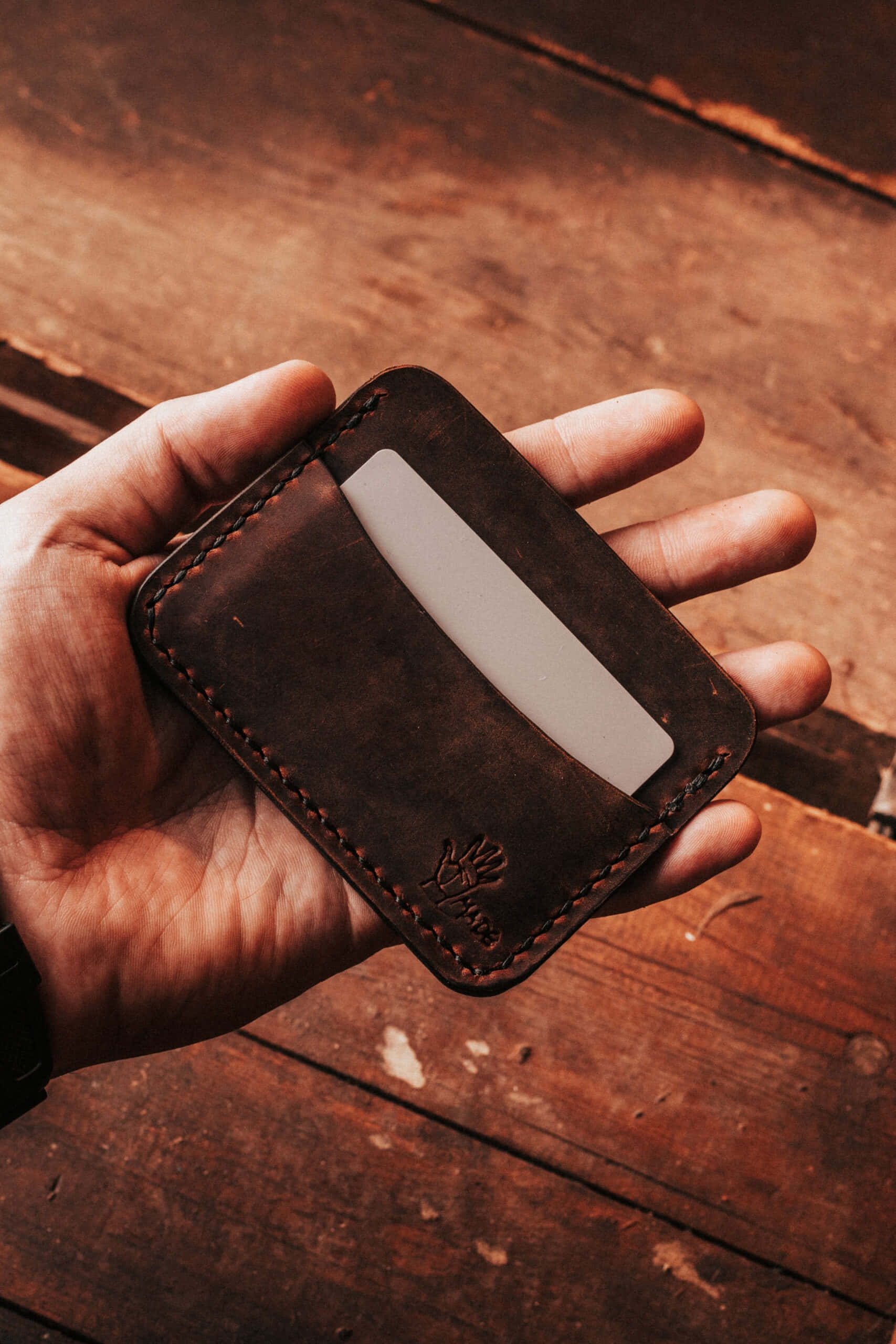 handheld leather card wallet, dark brown leather, single card slot, 2K Phone Wallpaper