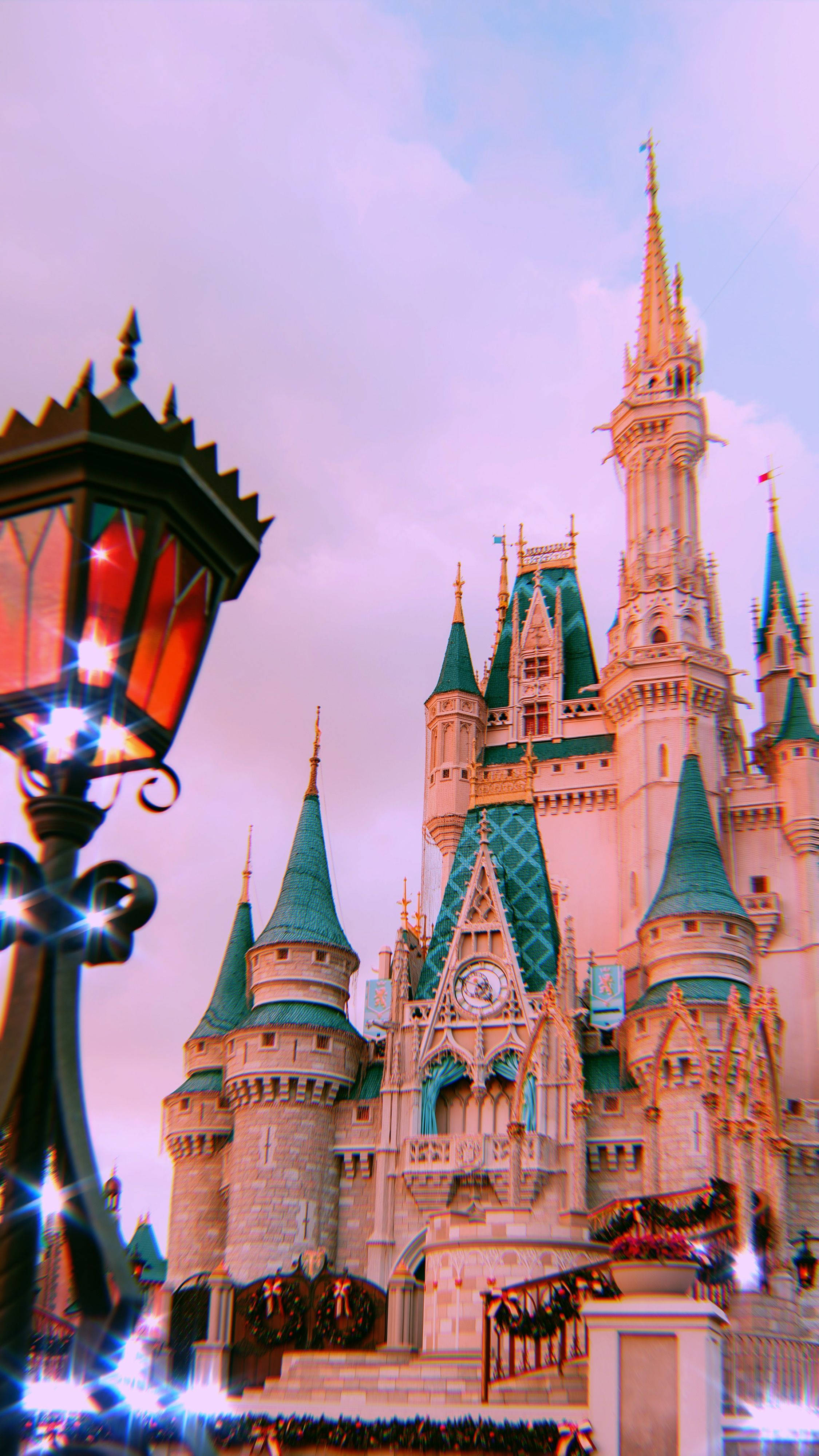Walt Disney World, sparkling castle, teal spires, 4K Phone Wallpaper