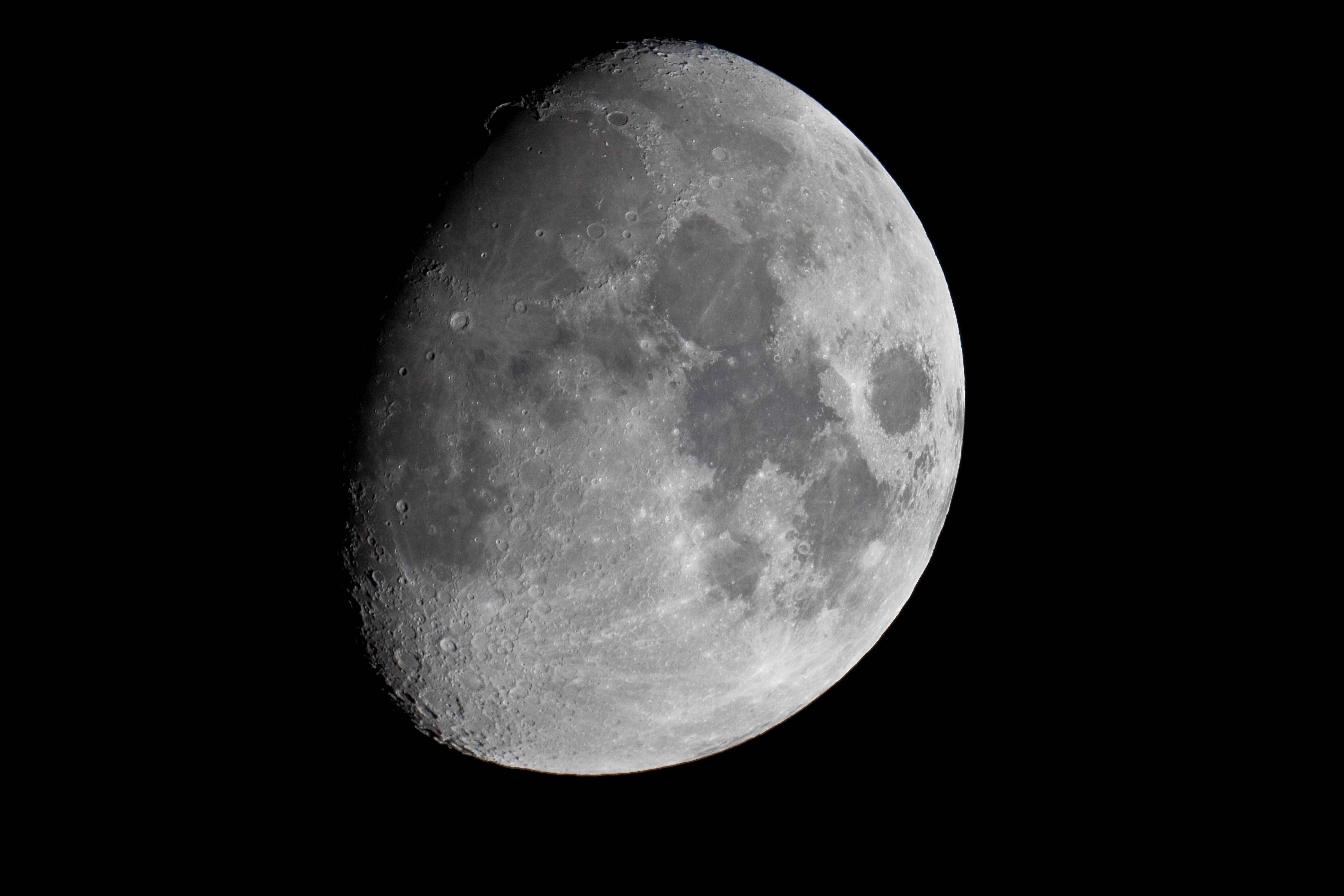 Waning Gibbous Moon, cratered surface, pitch-black sky, 4K Desktop Wallpaper