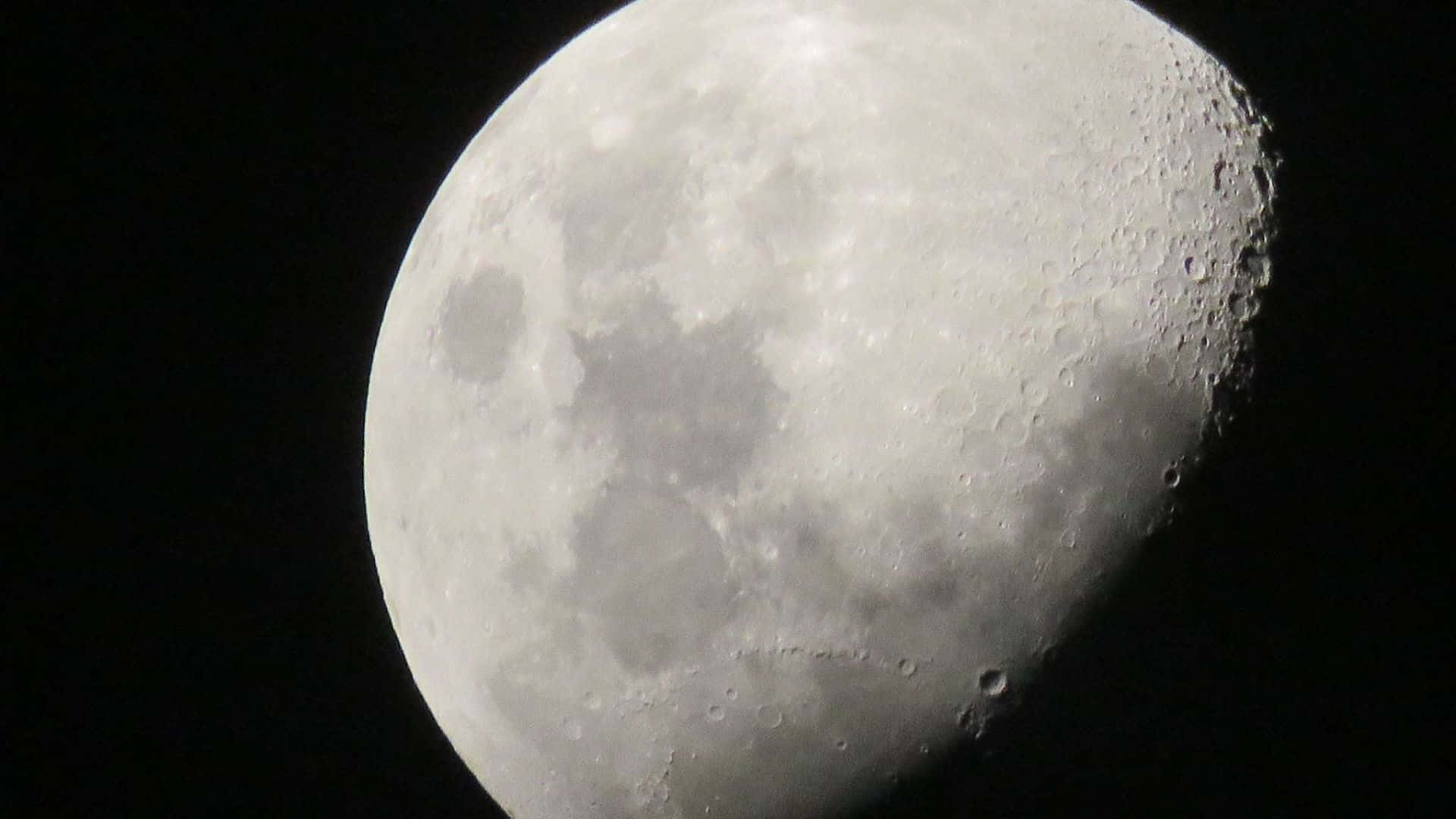 Waning Gibbous Moon, cratered surface, pitch-black sky, Full HD Desktop Wallpaper