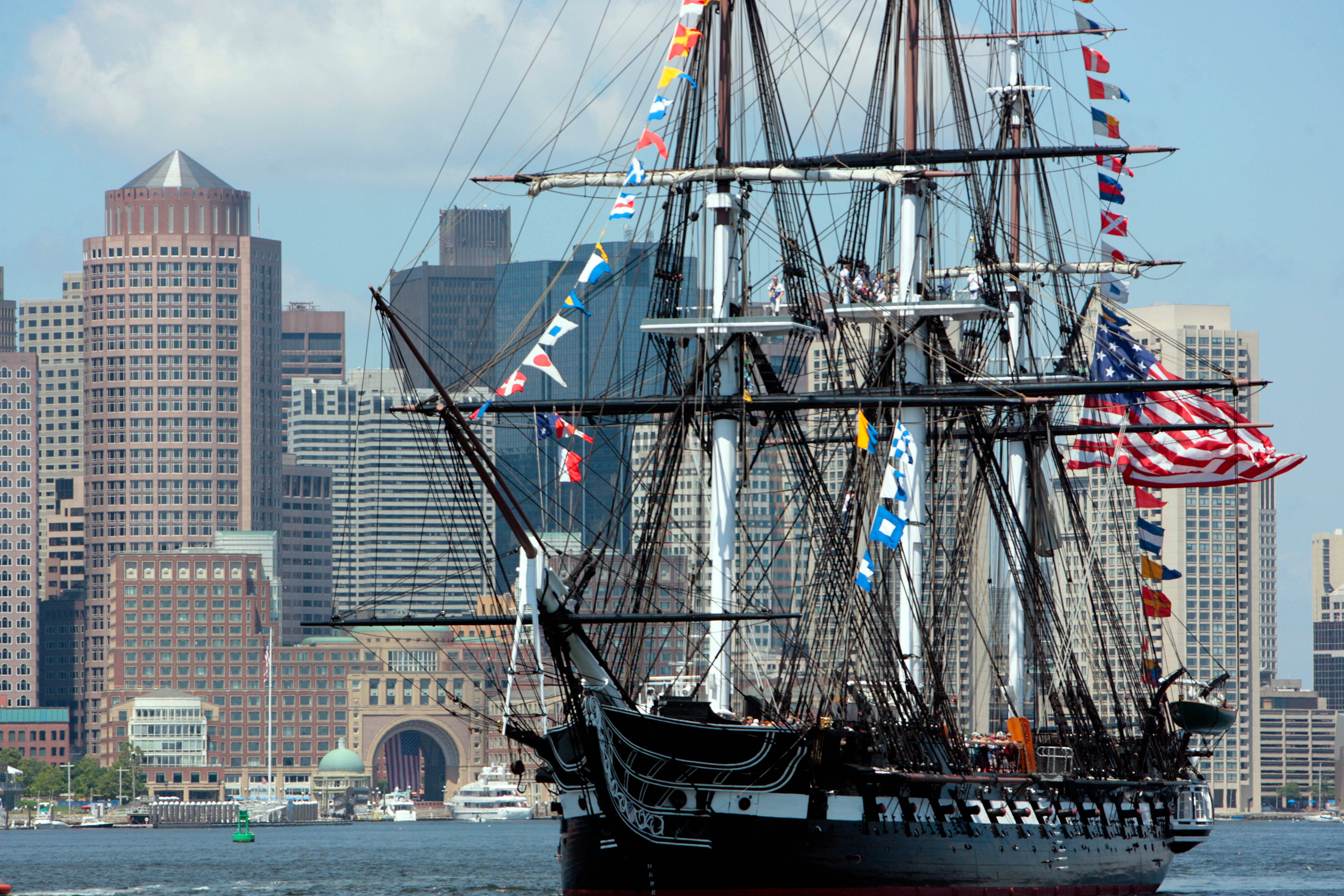 Warship, American flags, modern city skyline, 2K Desktop Wallpaper