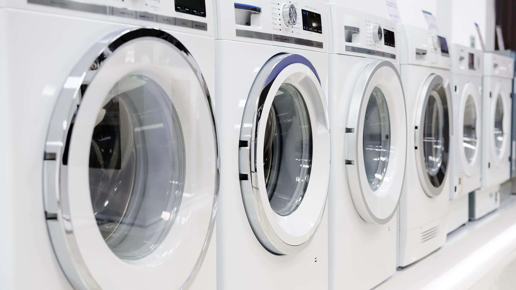 sleek white front-loading washing machines, bright retail appliance showroom, row of washing machines, Full HD Desktop Wallpaper
