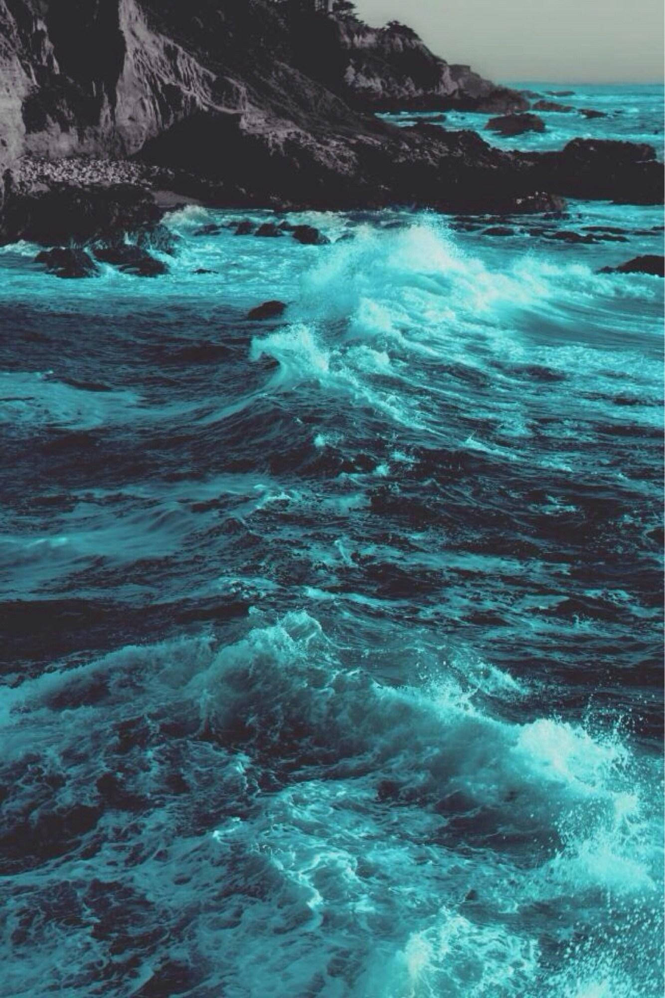 turquoise waves, dark rocky cliffs, muted sky, Full HD Phone Wallpaper