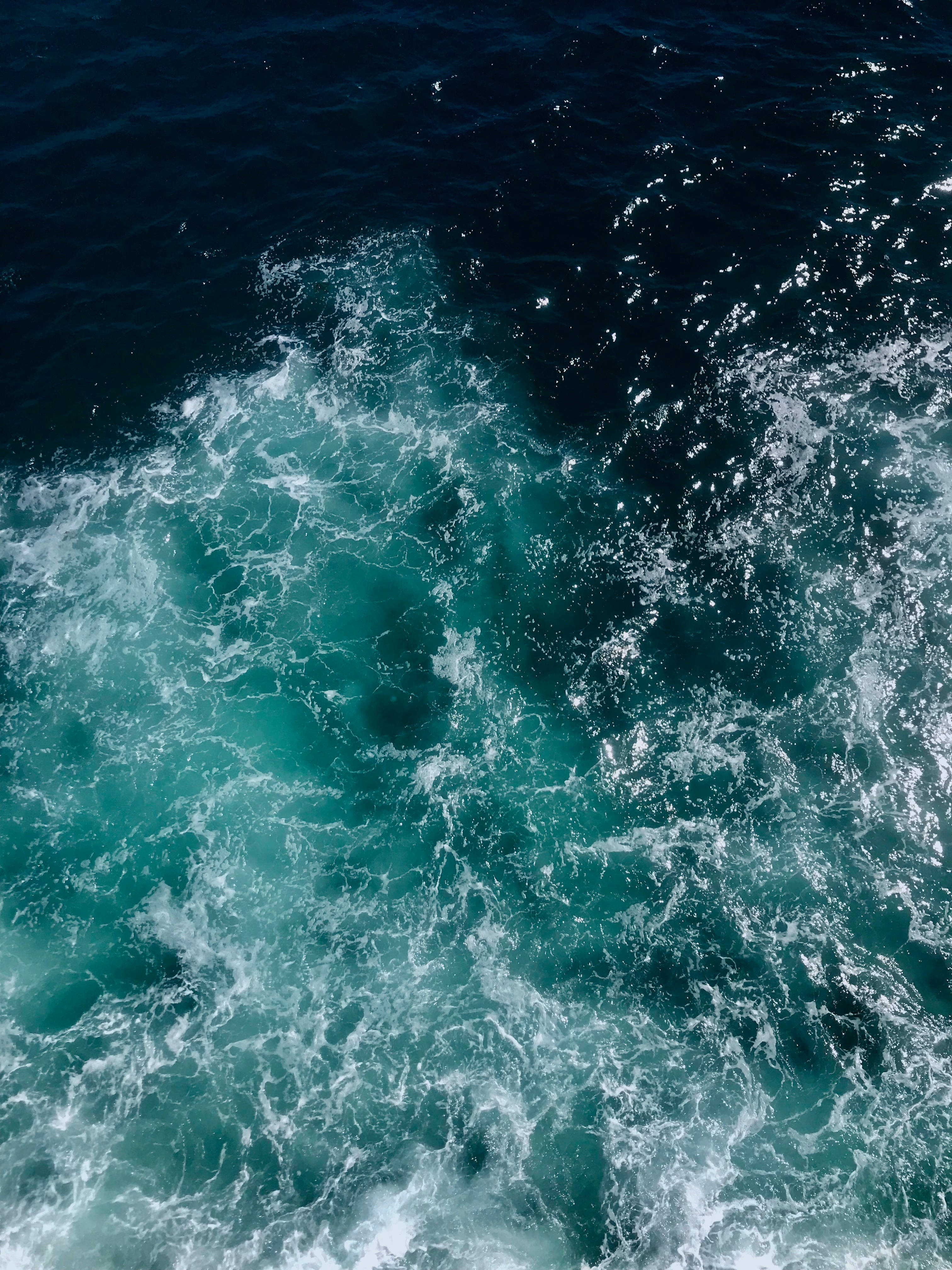turquoise ocean, deep blue water, bright sunlight, 4K Phone Wallpaper