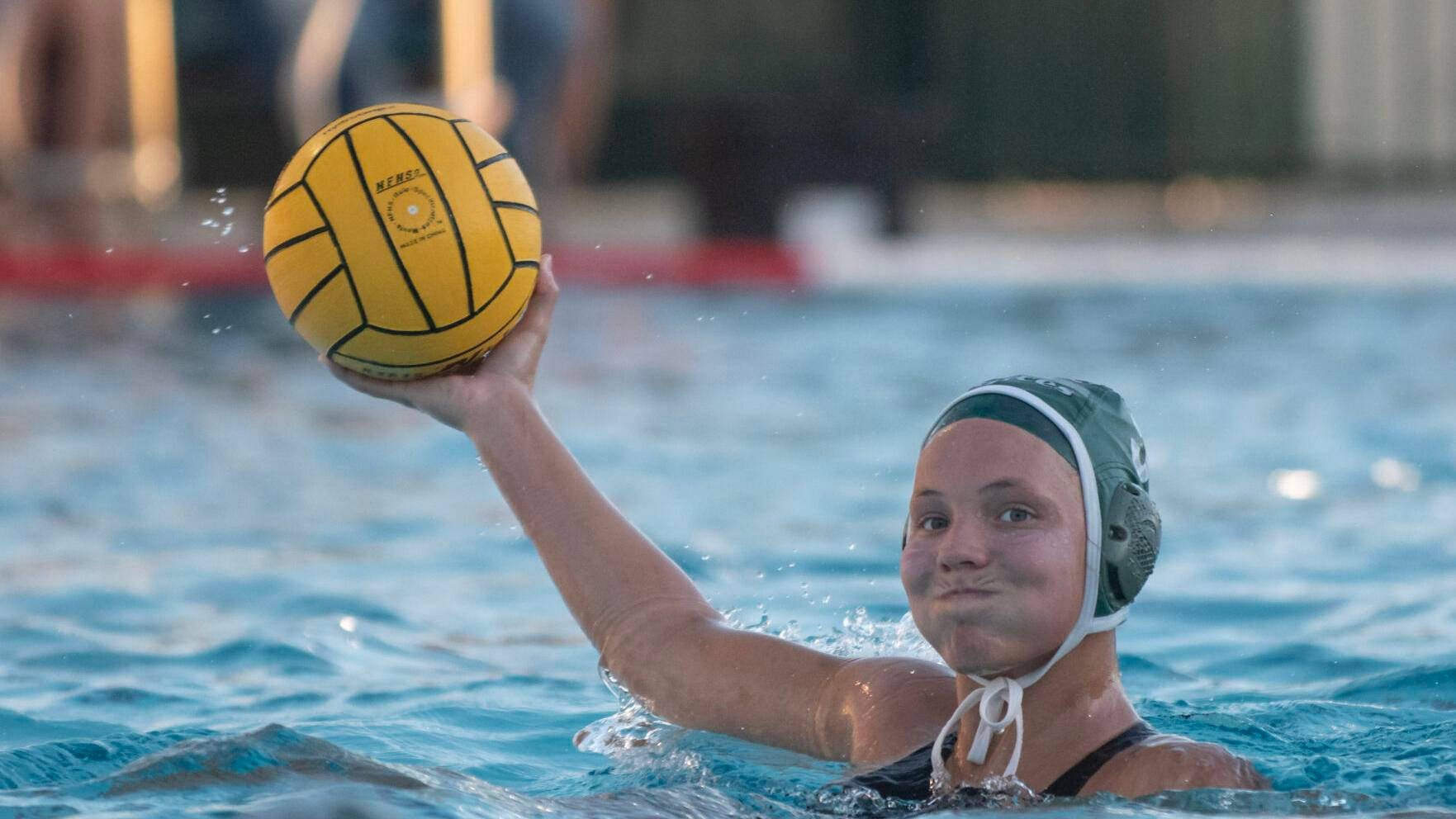 women's water polo varsity player, green cap, yellow ball, HD Desktop Wallpaper