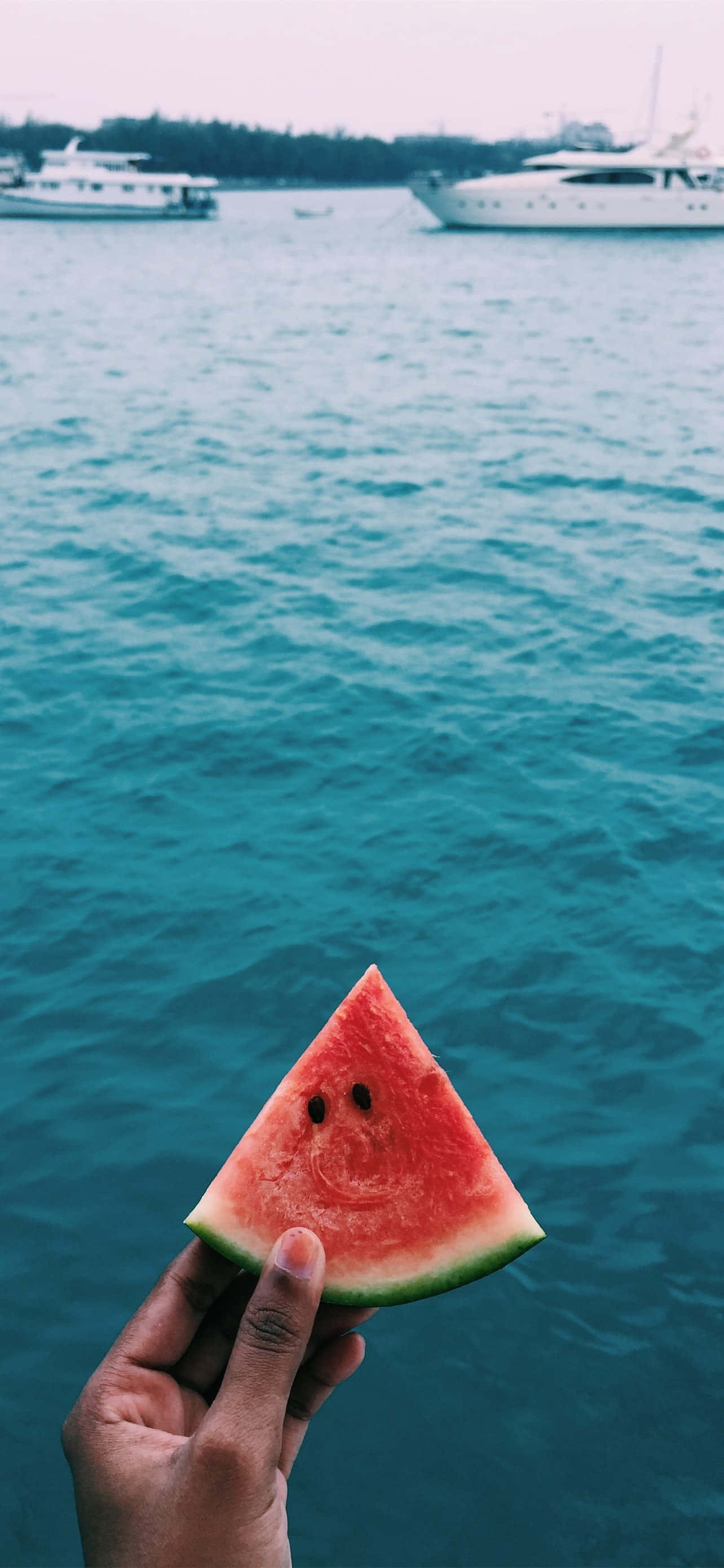 watermelon slice, smiley face, turquoise sea, 2K Phone Wallpaper