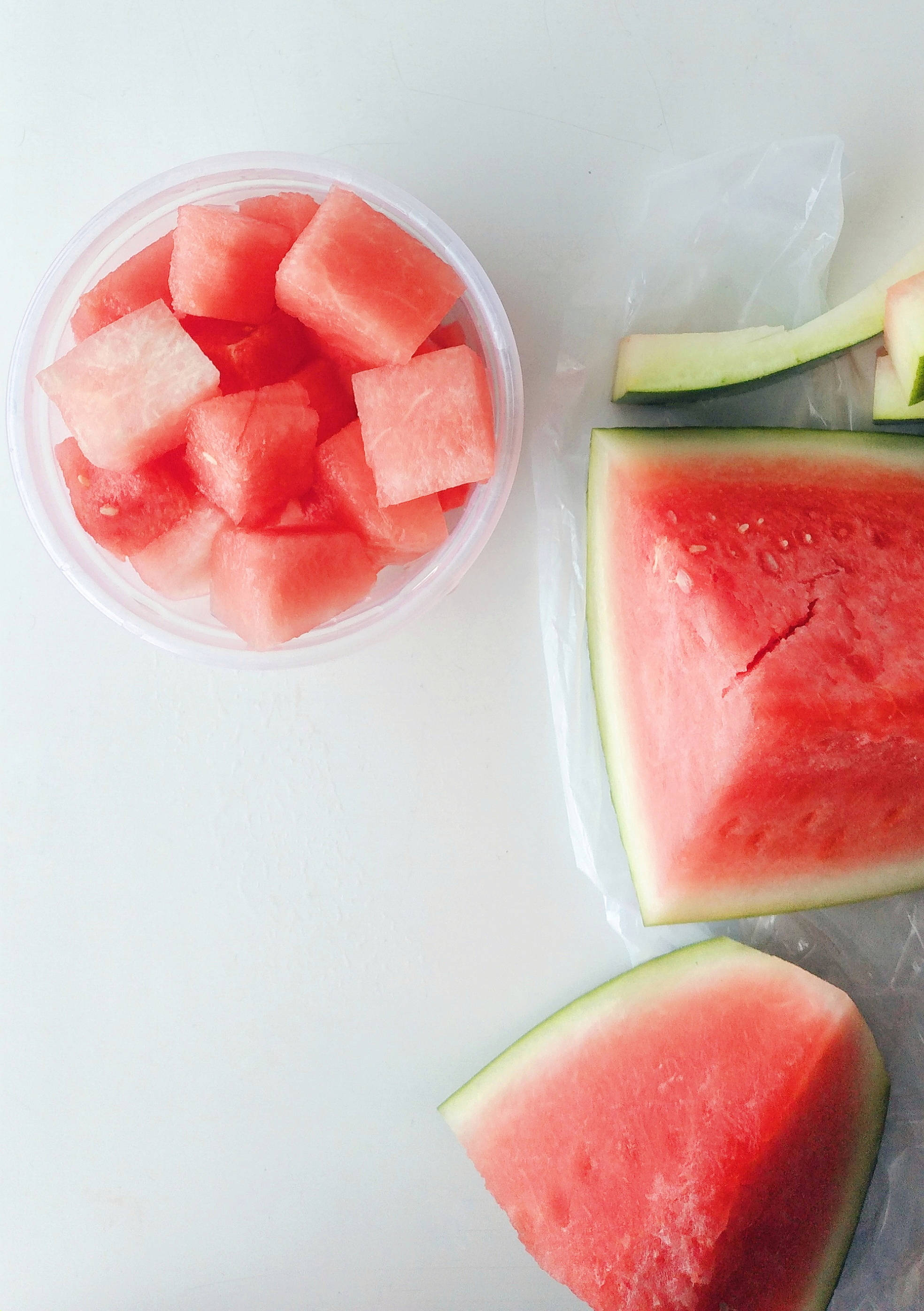 minimalist seedless watermelon, freshly cut watermelon slices, watermelon cubes, 2K Phone Wallpaper