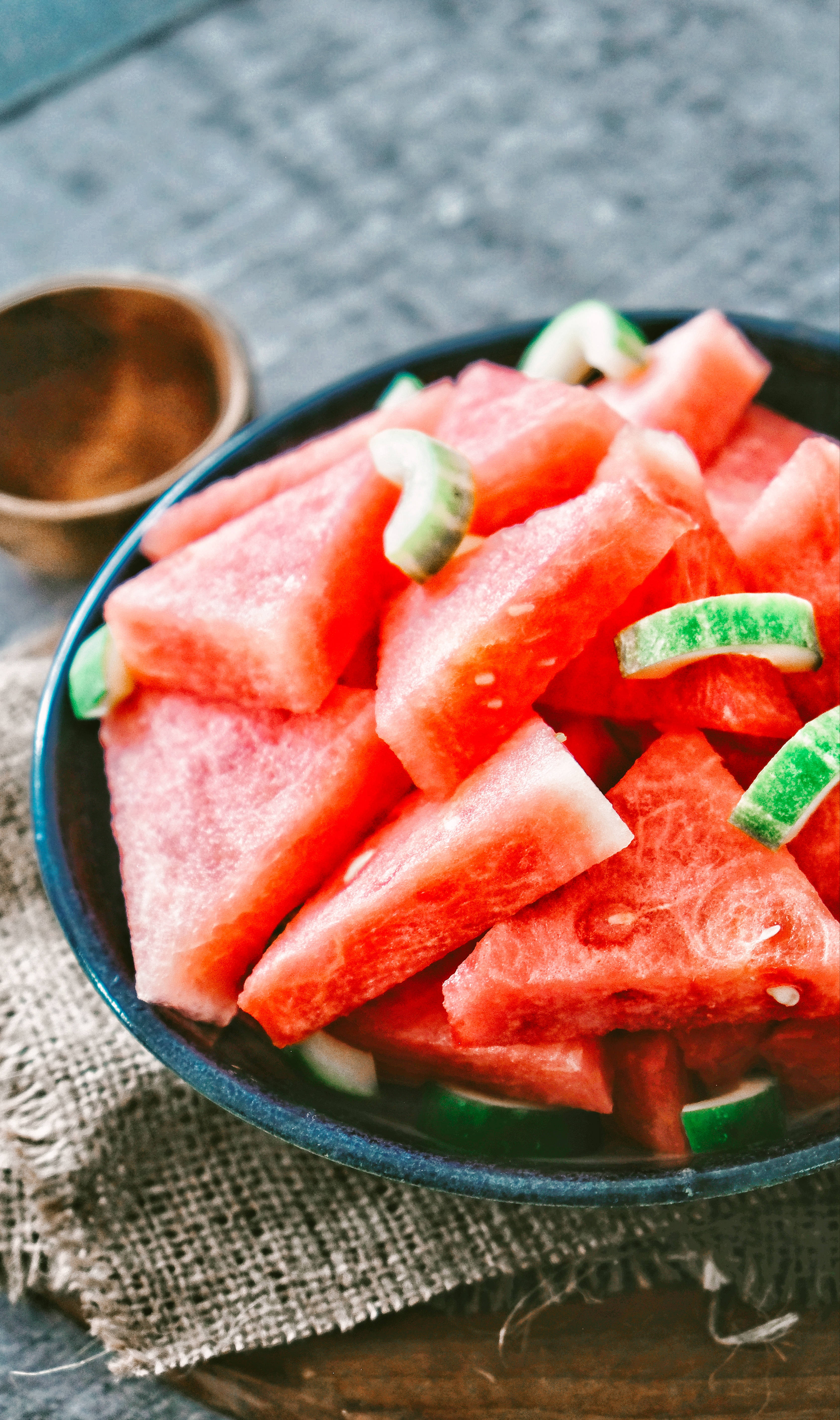 plated seedless watermelon slices, dark bowl, juicy red watermelon slices, 5K Phone Wallpaper