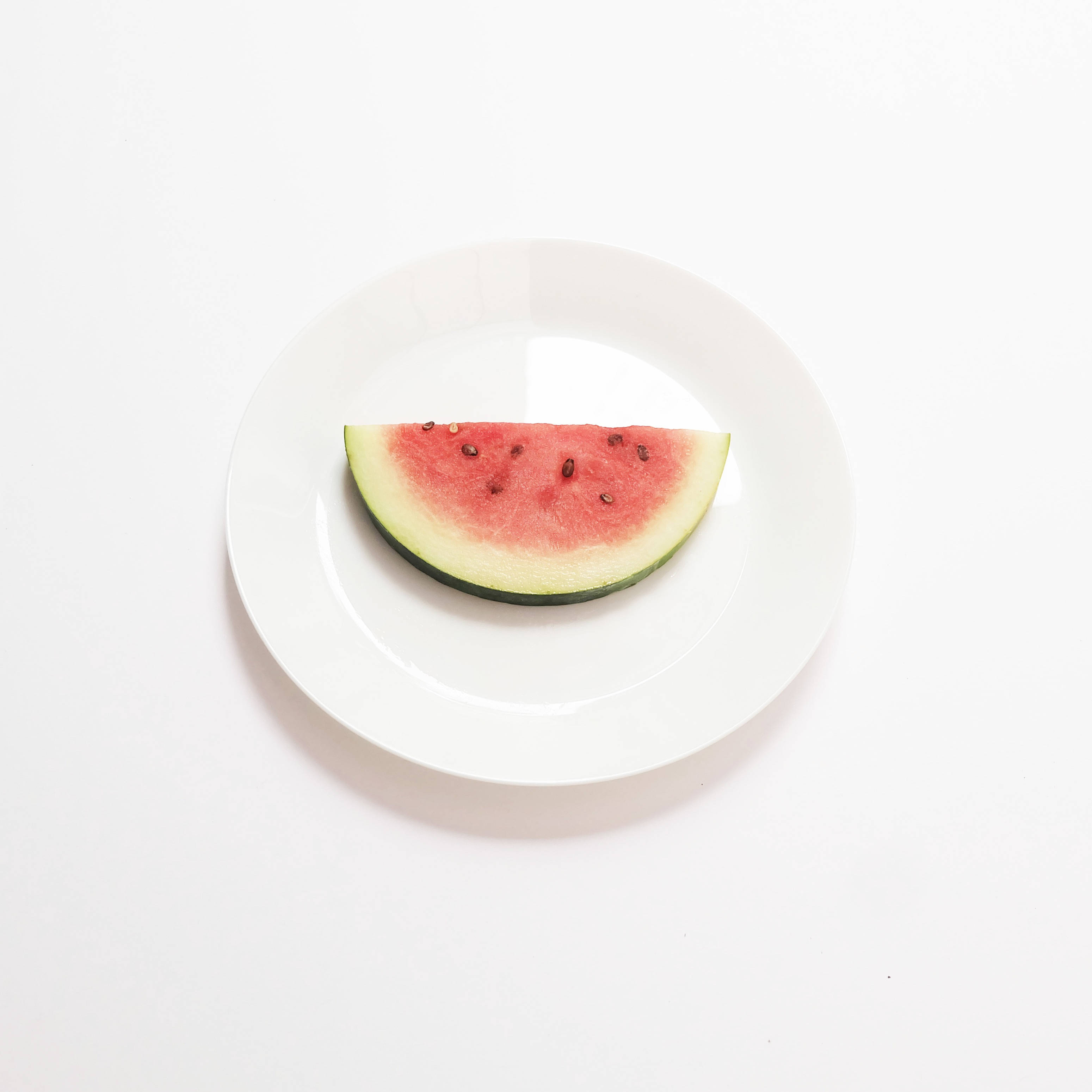 watermelon slice, white plate, white background, 2K Phone Wallpaper