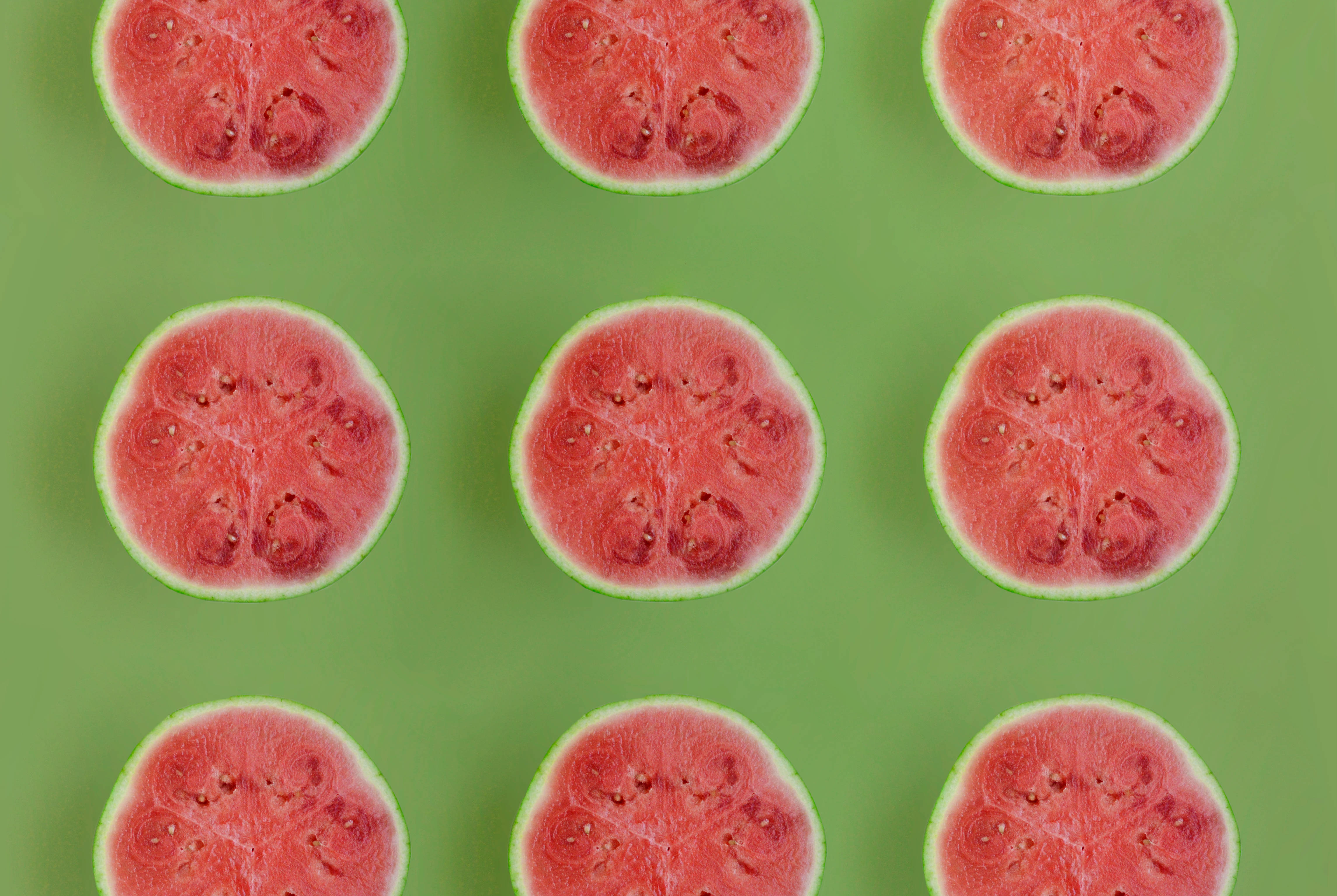 lined watermelon slices, vibrant green background, nine watermelon slices, 4K Desktop Wallpaper