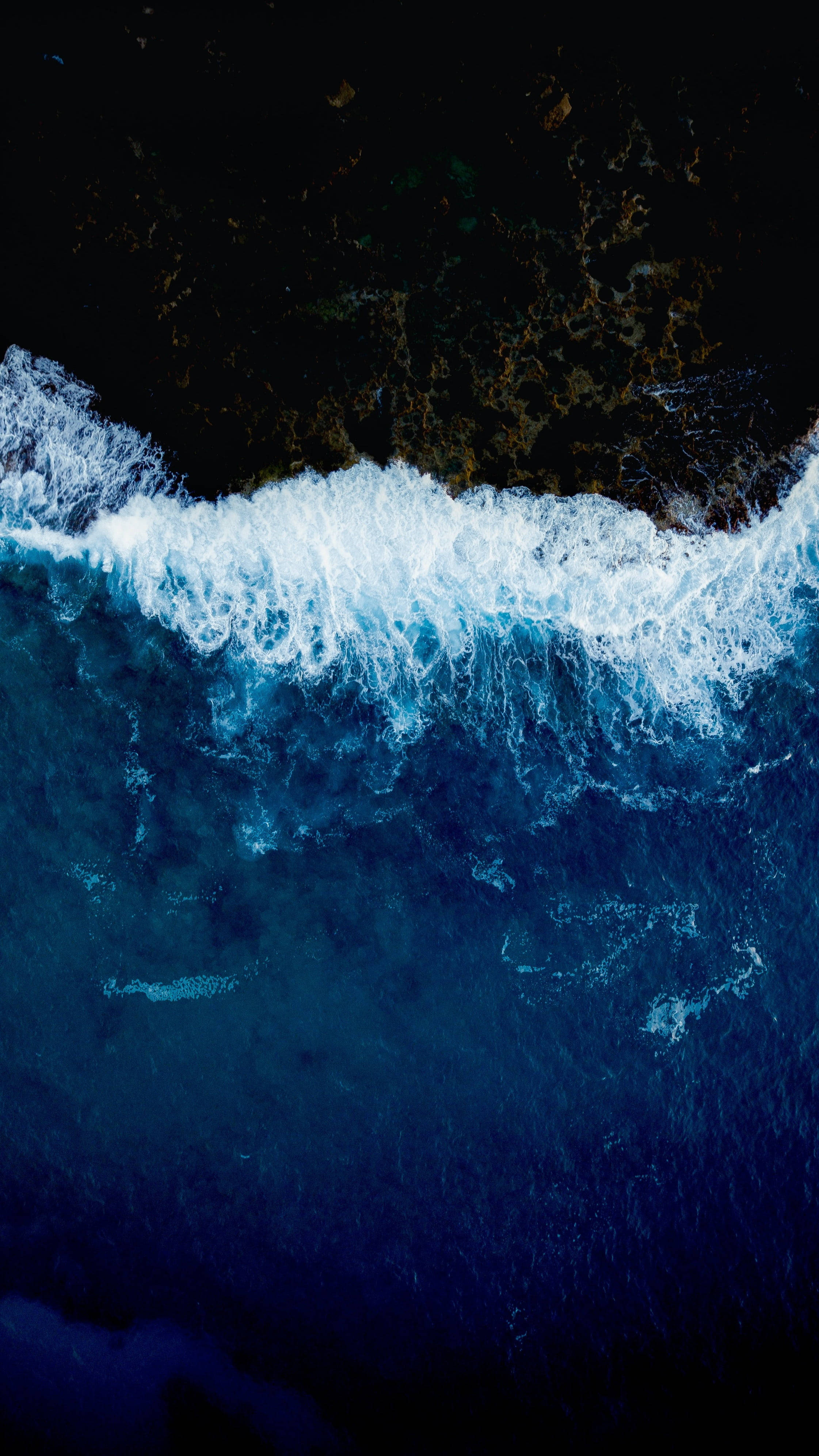 dark rocky beach, ocean wave, vivid blue, 4K Phone Wallpaper