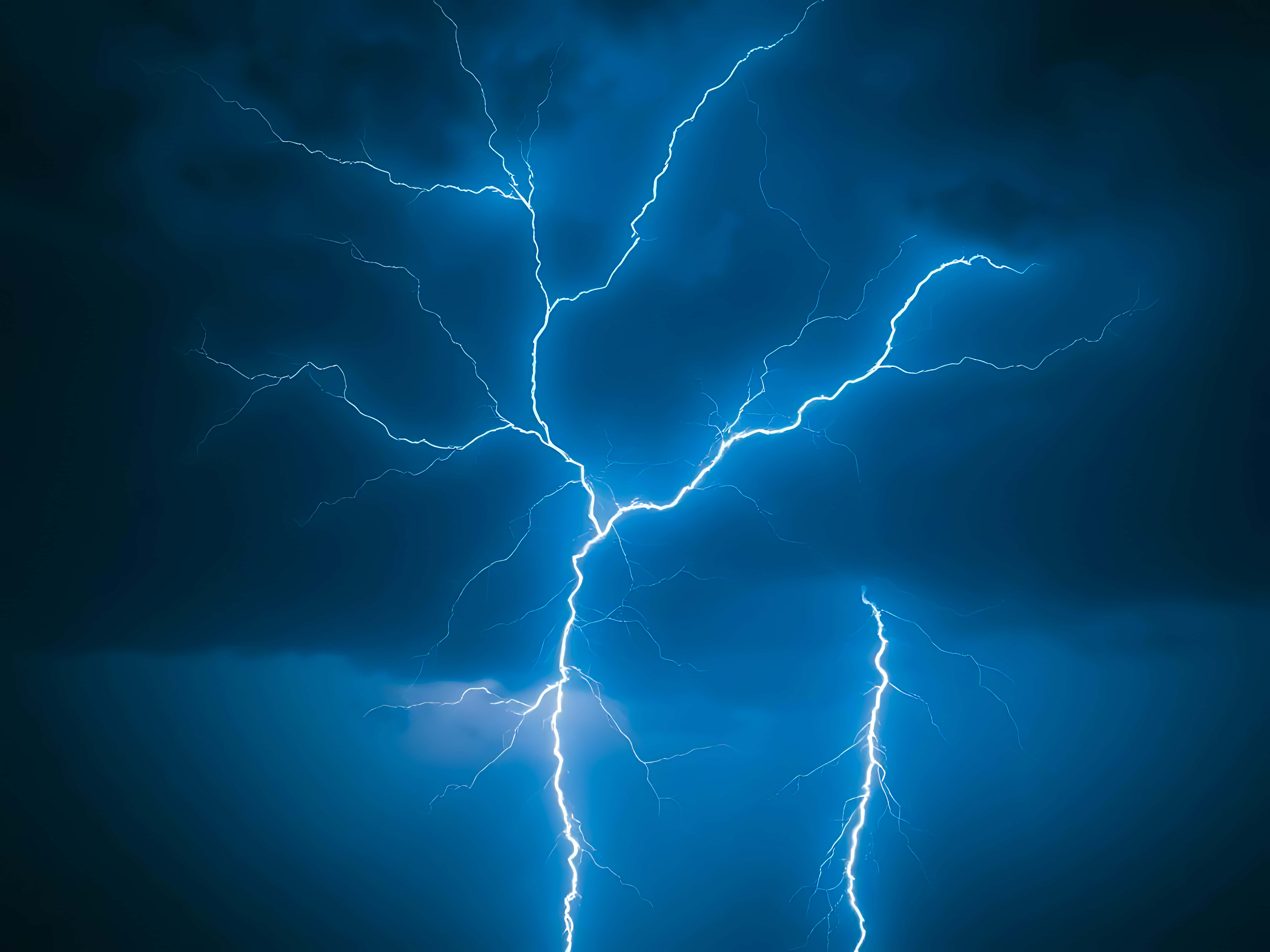 lightning bolt, deep blue stormy sky, jagged electric branches, 5K Desktop Wallpaper