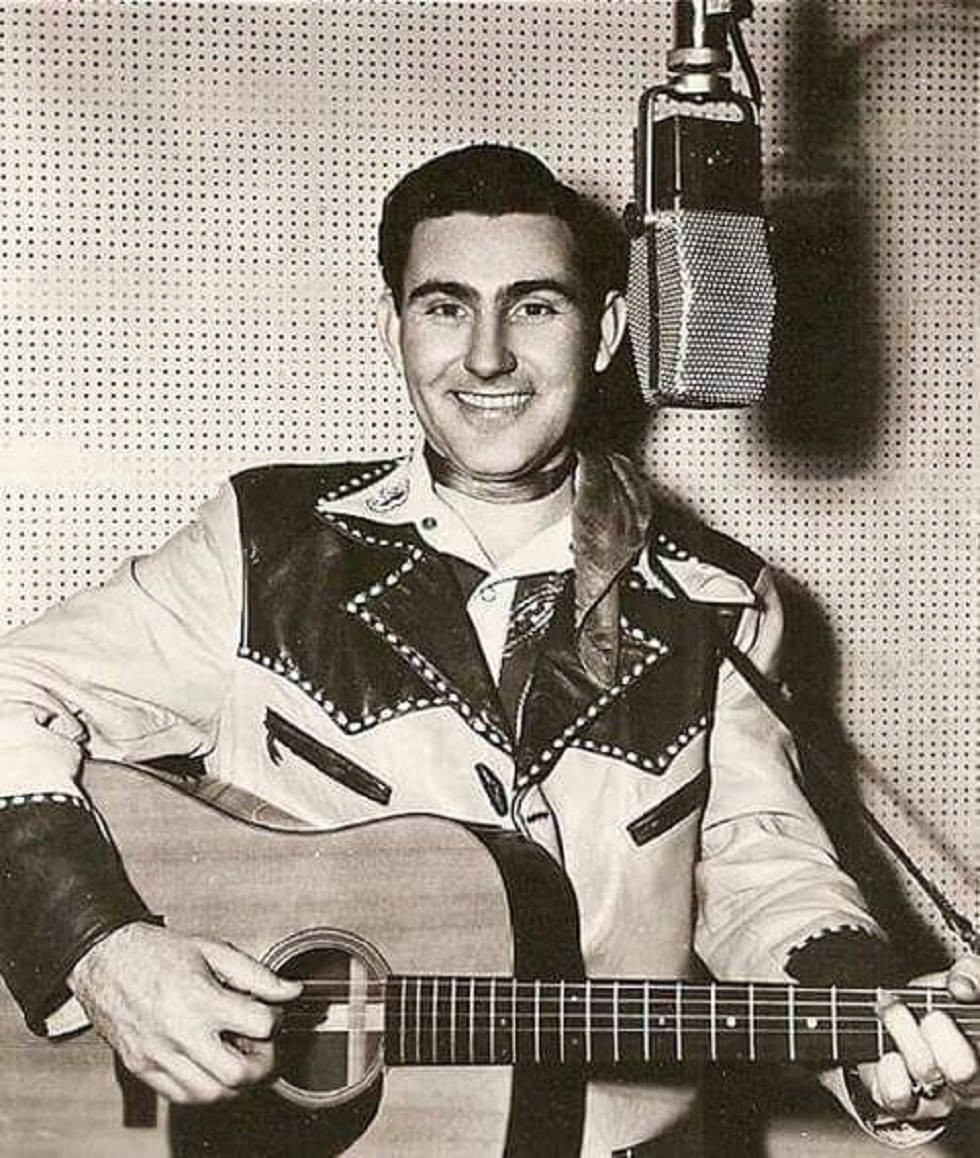 Webb Pierce, studded leather jacket, acoustic guitar, SD Phone Wallpaper