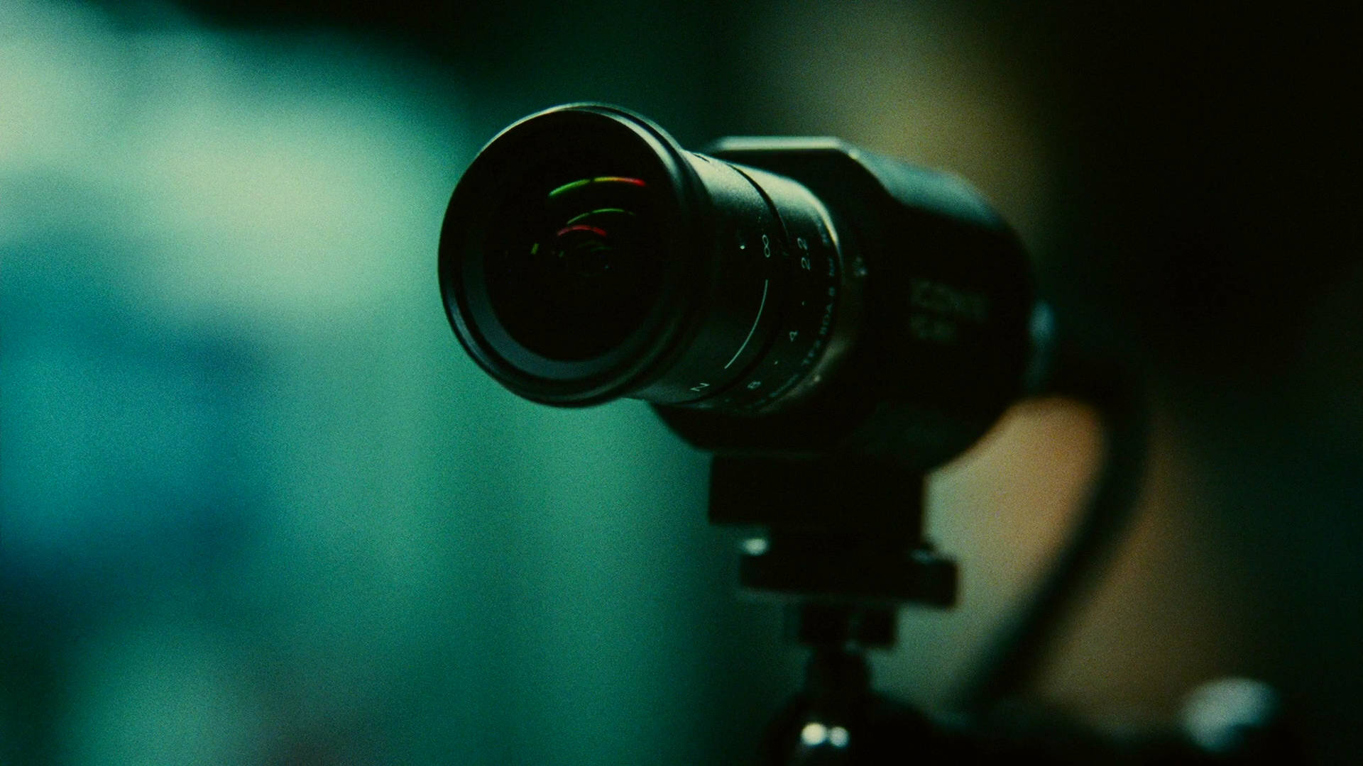 black camera lens, tripod, blurred teal background, Full HD Desktop Wallpaper
