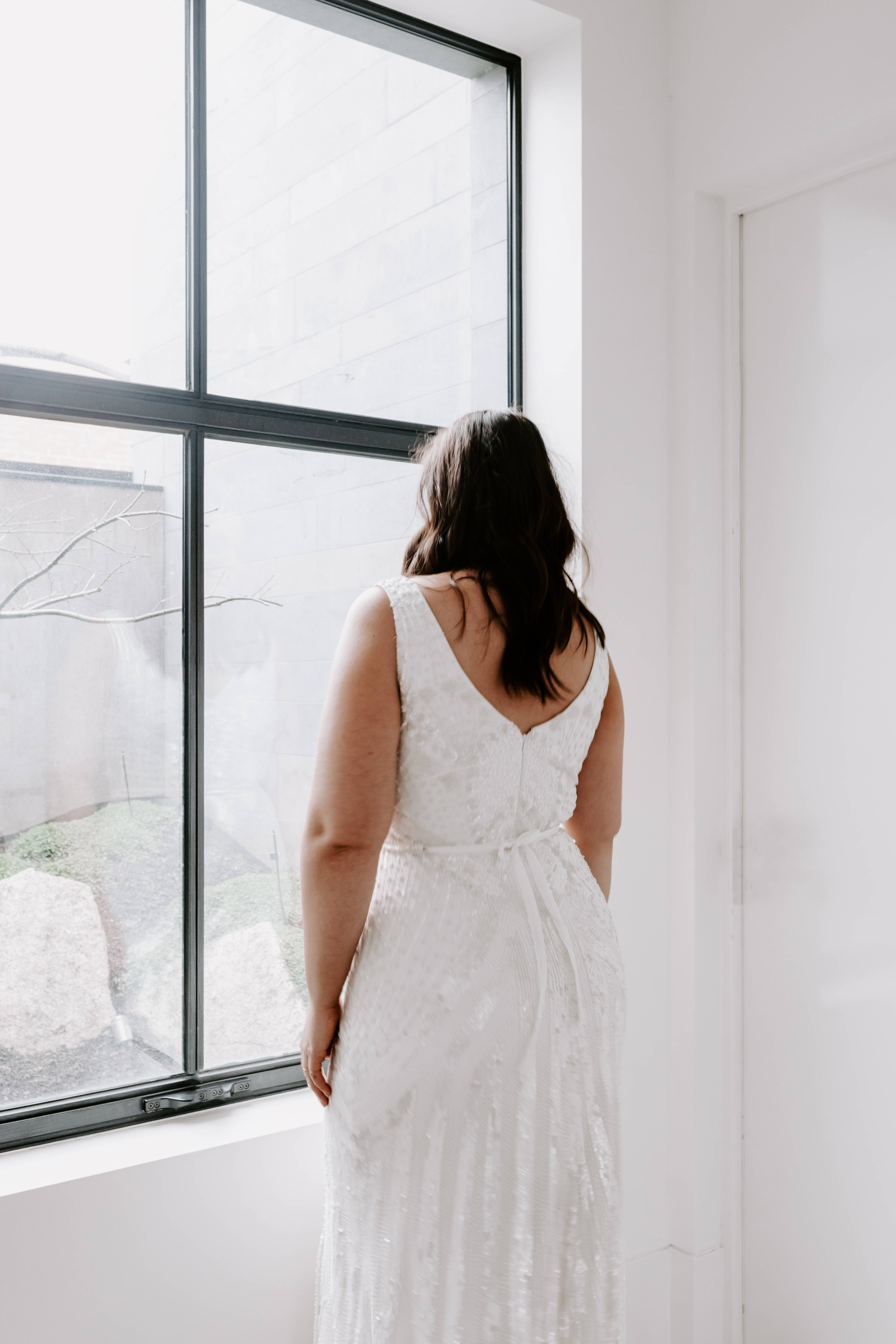 white lace dress, large window, quiet urban courtyard, 5K Phone Wallpaper