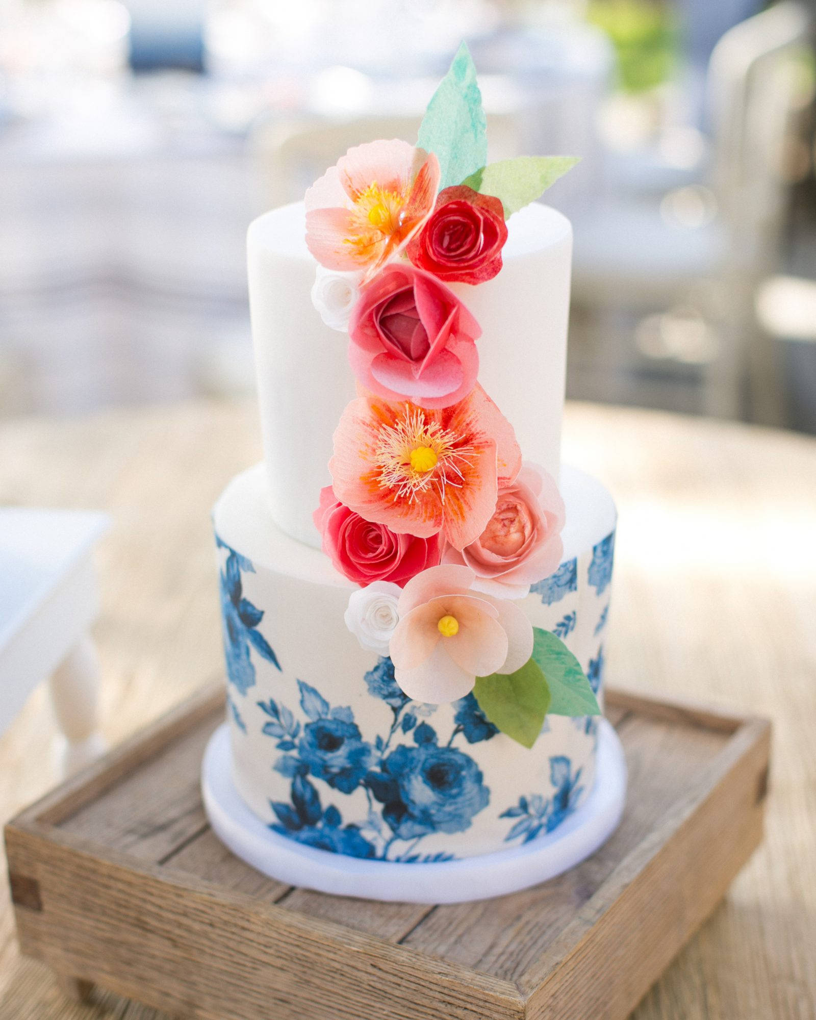 two-tiered white cake, vibrant coral pink and red sugar flowers, blue floral patterns, Full HD Phone Wallpaper