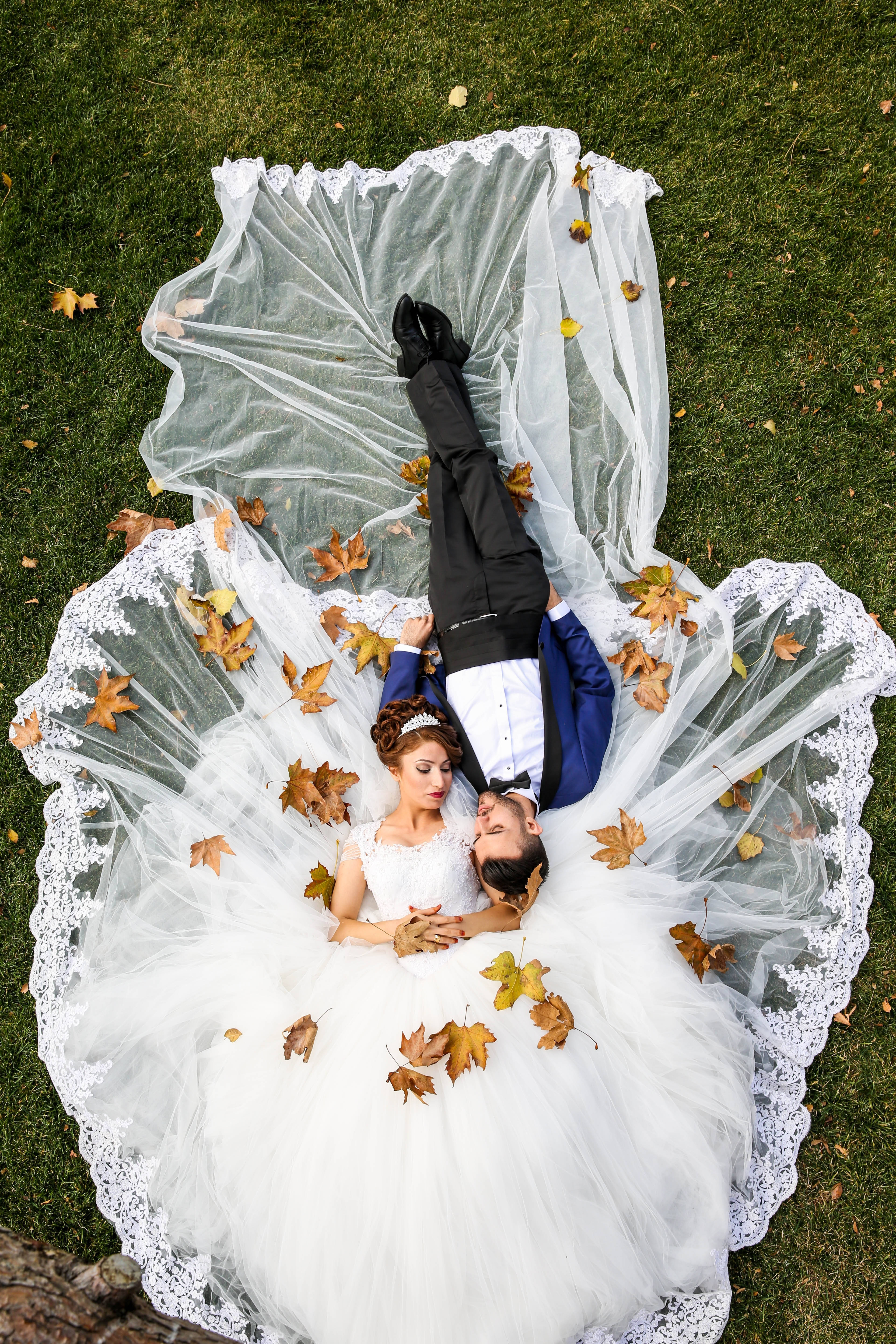 bride and groom, autumn leaves, grass, 5K Phone Wallpaper