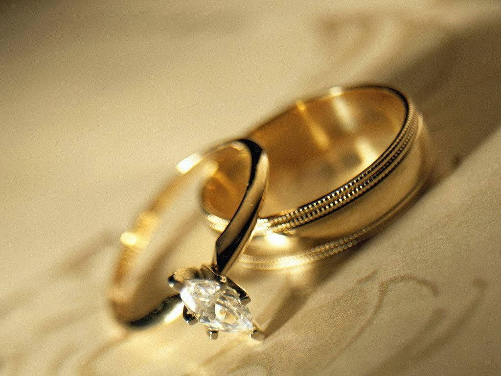 gold wedding bands, diamond engagement ring, cream fabric, SD Desktop Wallpaper