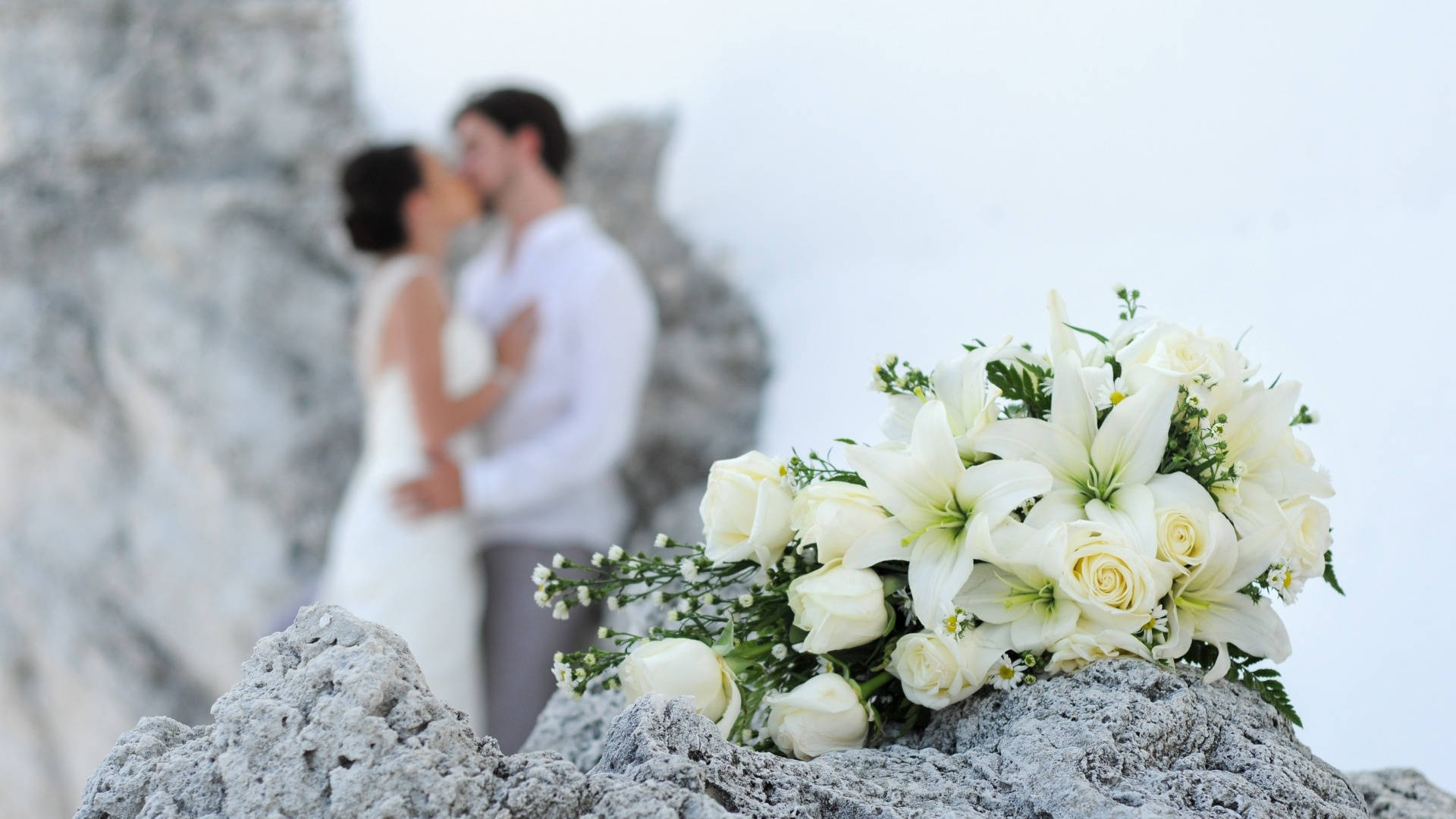 white floral bouquet, gray rocks, blurred couple, Full HD Desktop Wallpaper