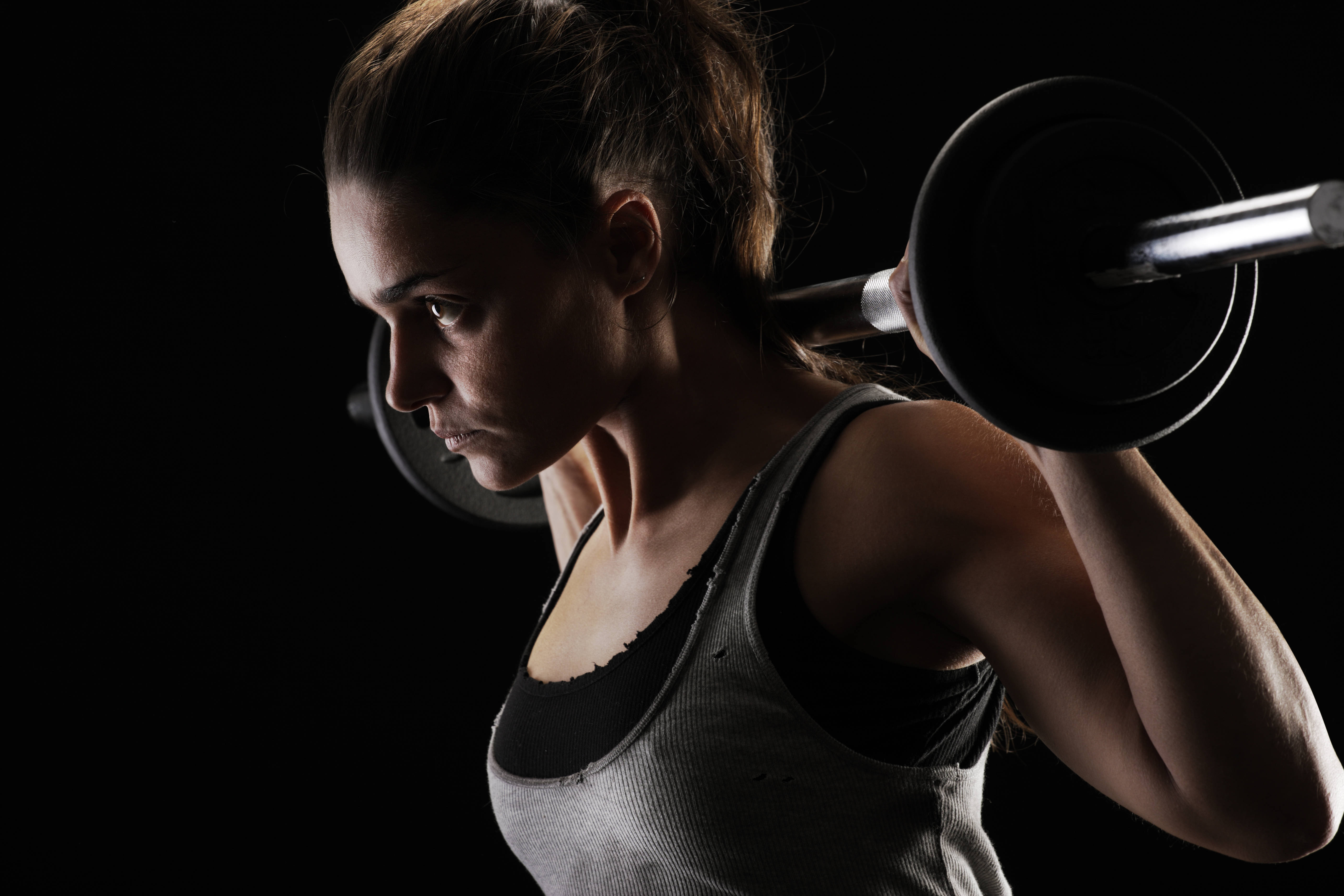 barbell, stark black background, dramatic side lighting, 5K Desktop Wallpaper
