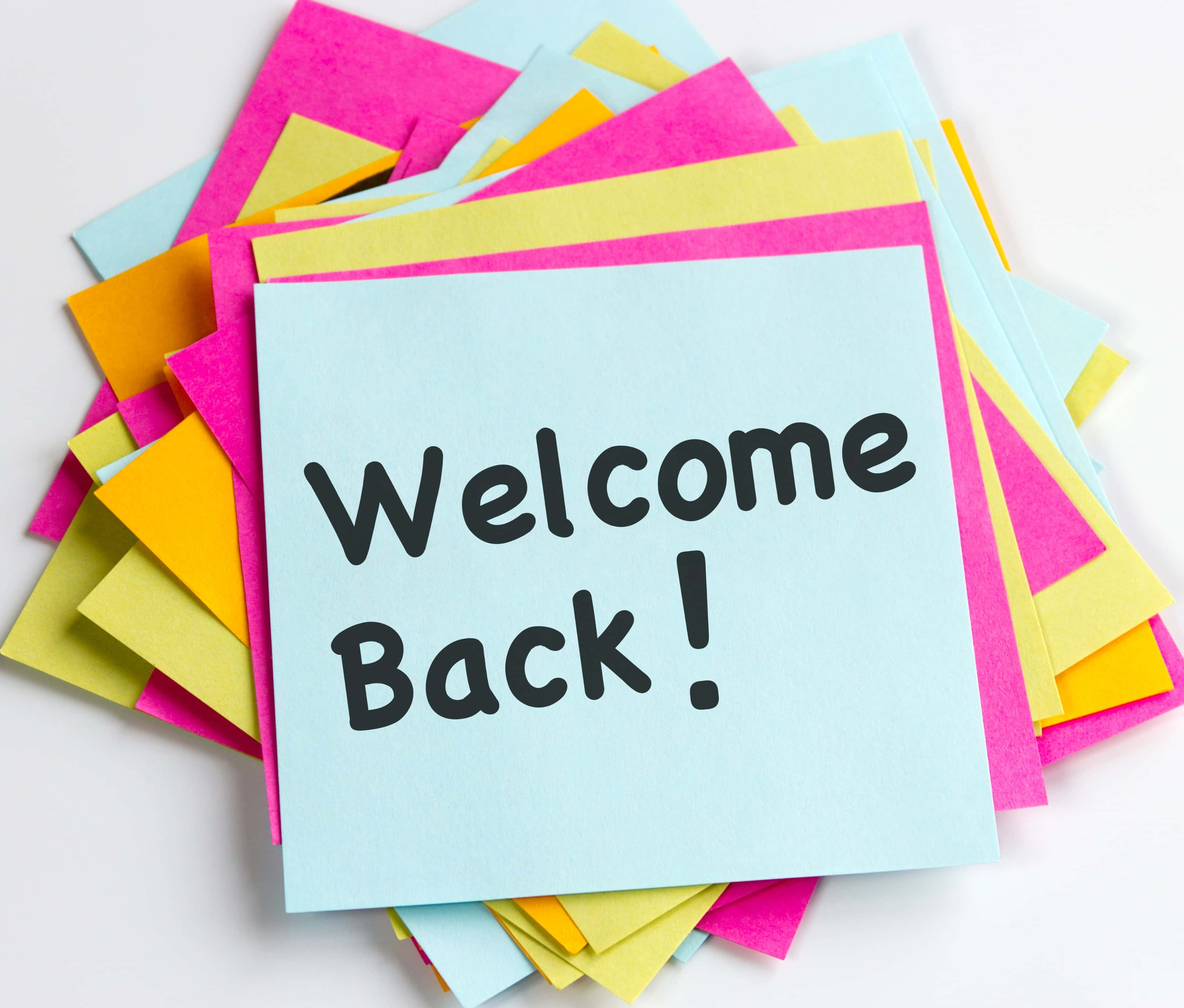Welcome Back!, light blue sticky note, bold black text, 2K Desktop Wallpaper