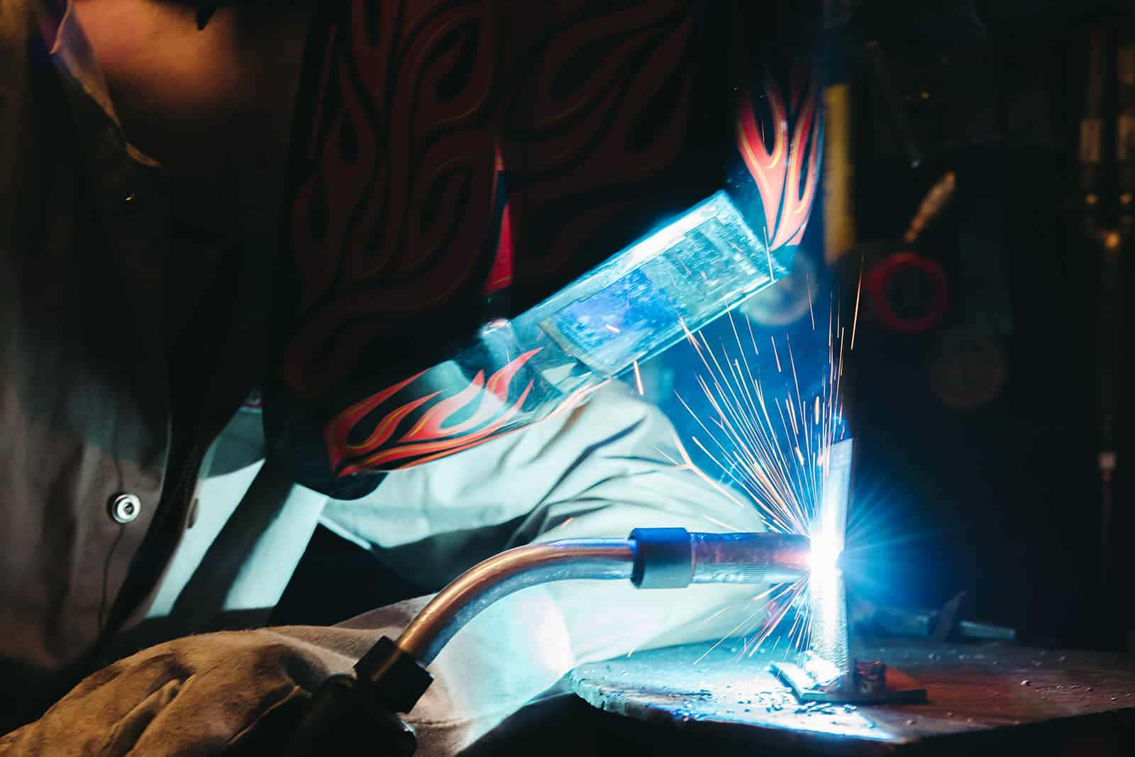 welding torch, flame-patterned jacket, blue sparks, HD Desktop Wallpaper