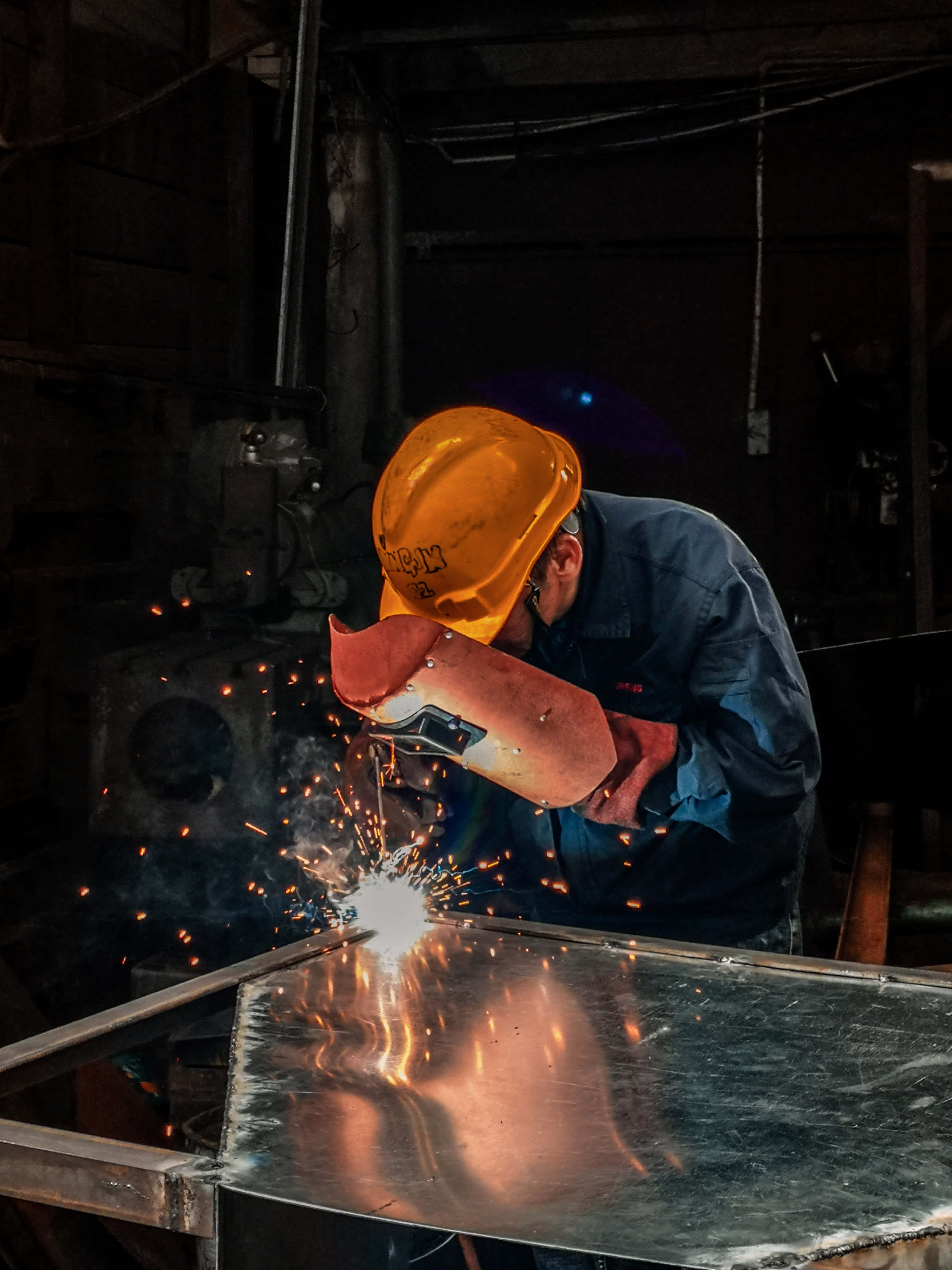 welder, yellow helmet, blue overalls, 4K Phone Wallpaper