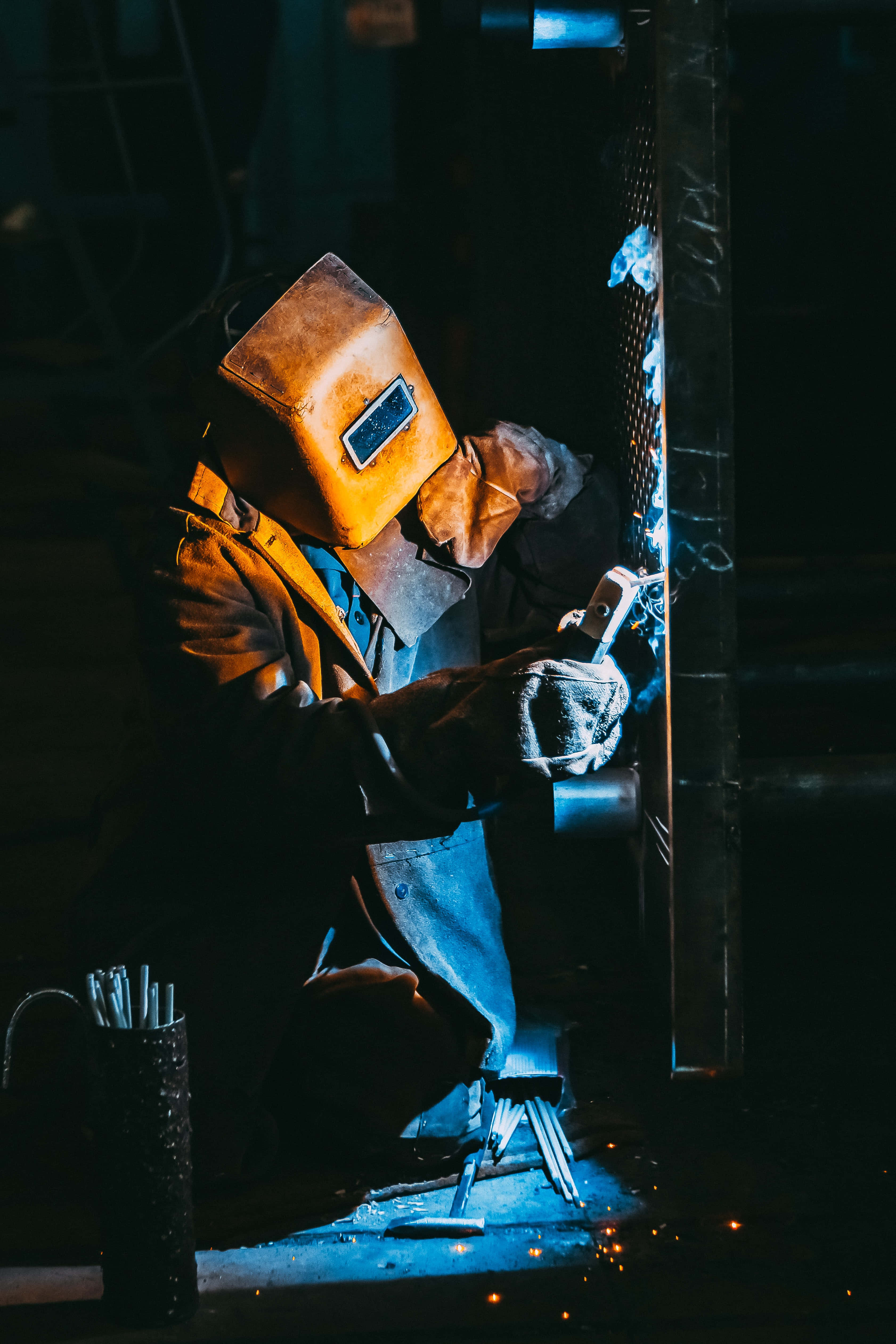 welder, dim workshop, bright sparks, 4K Phone Wallpaper