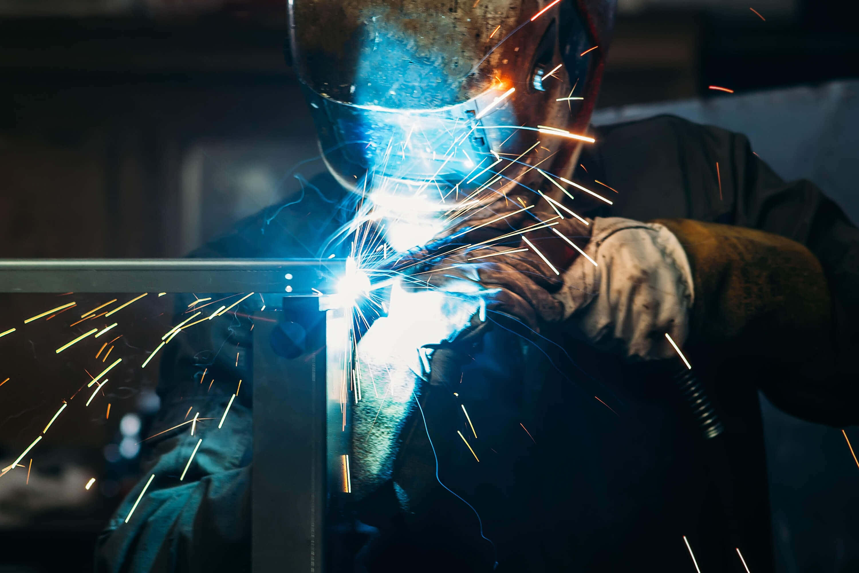 welder, protective gear, bright blue sparks, 2K Desktop Wallpaper