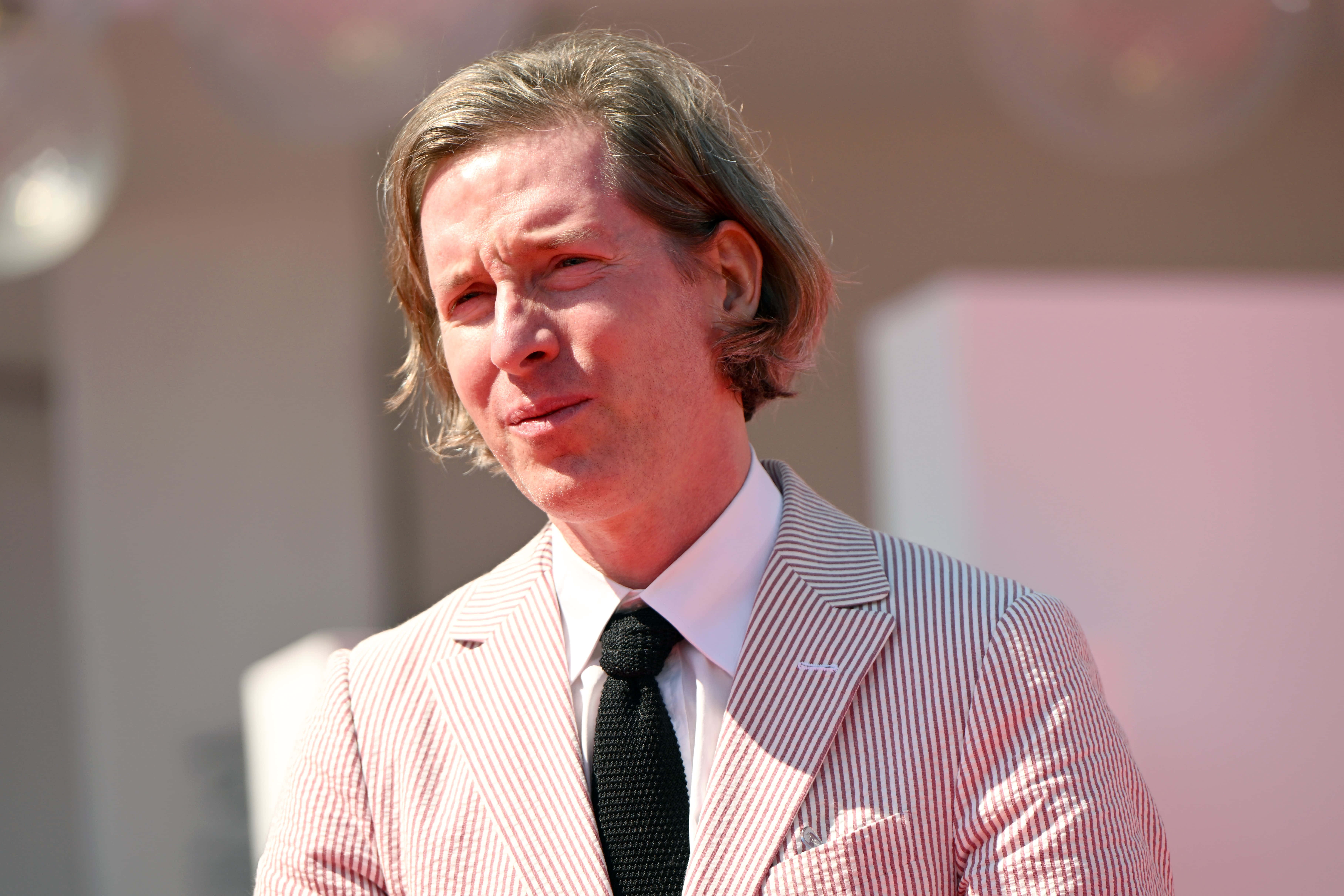 Wes Anderson, pink pinstripe suit, black tie, 5K Desktop Wallpaper