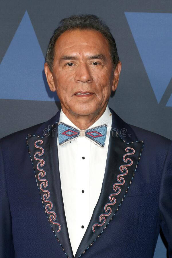 Wes Studi, navy suit, red and white embroidery, SD Phone Wallpaper