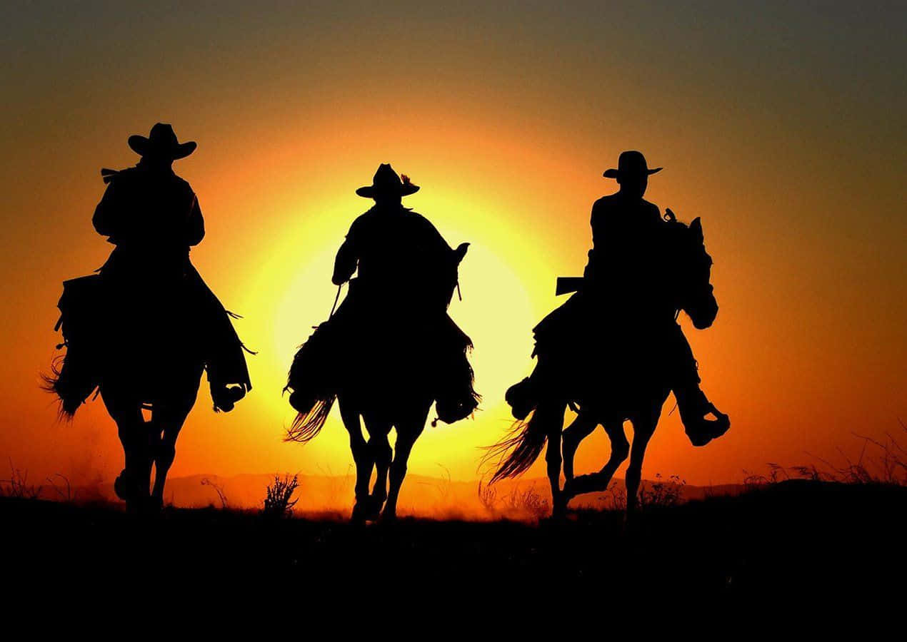 cowboys, horses, fiery sunset sky, SD Desktop Wallpaper