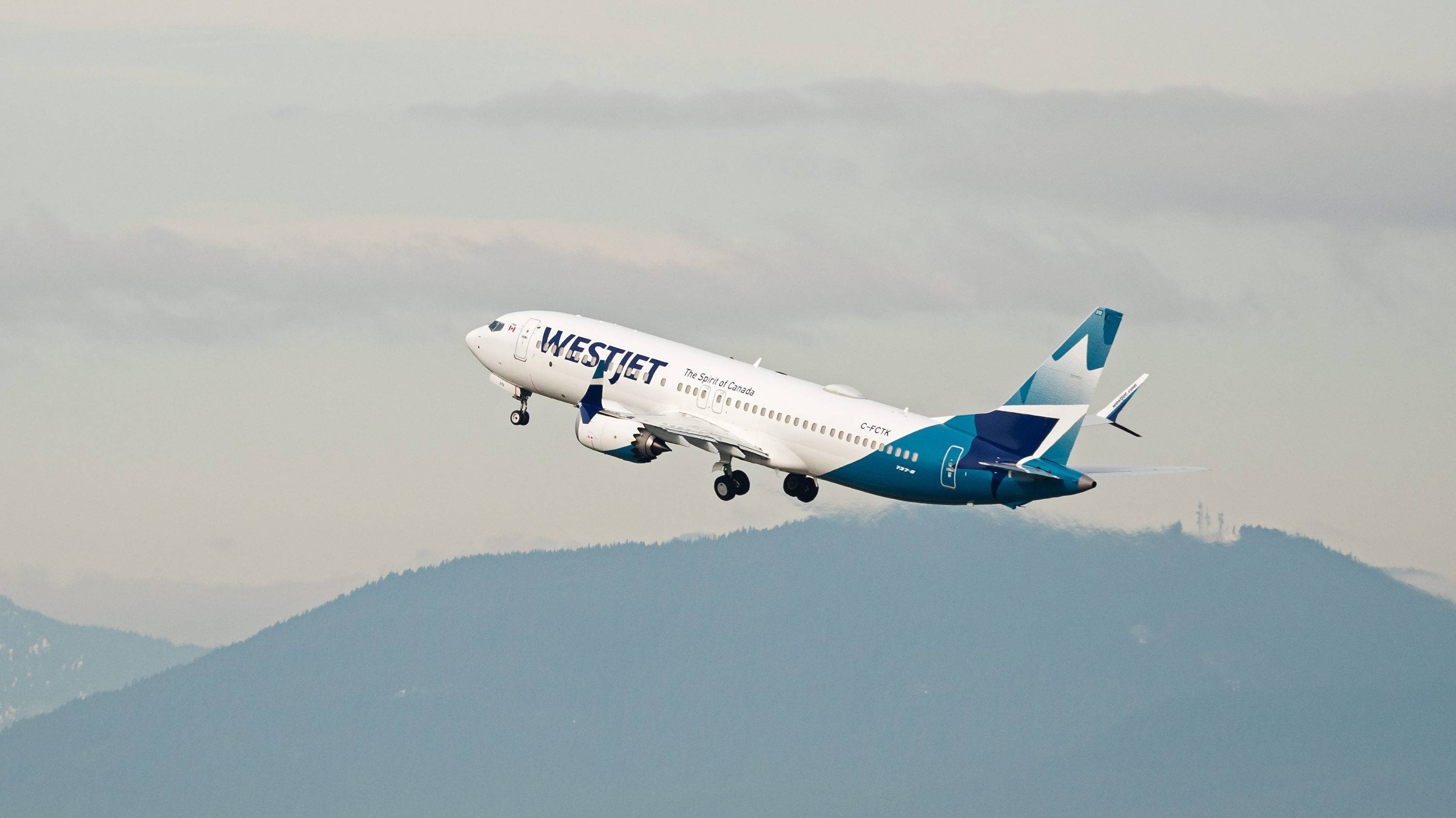 WestJet, airplane, hazy sky, 2K Desktop Wallpaper