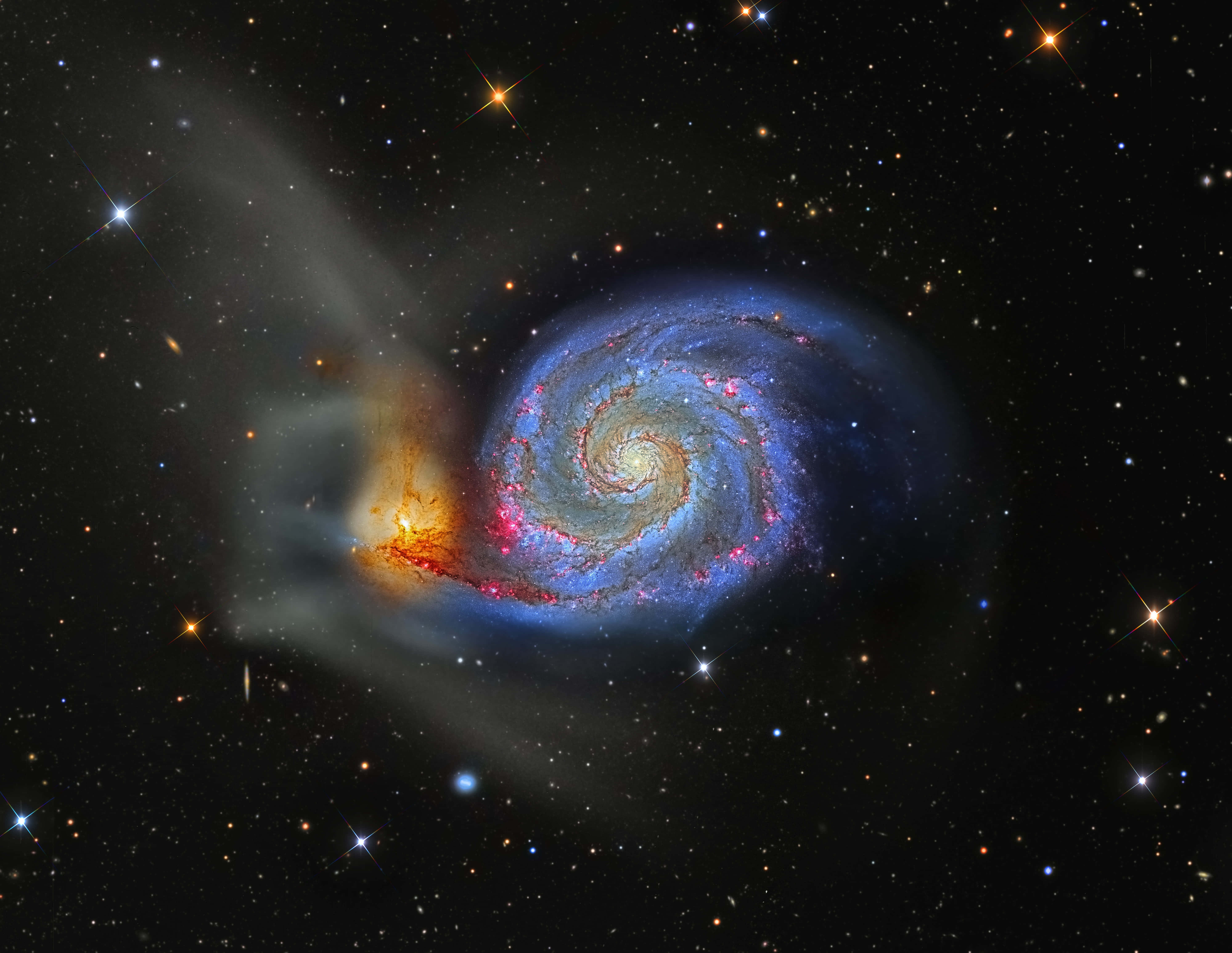 Whirlpool Galaxy, blue arms, red star-forming regions, 5K Desktop Wallpaper