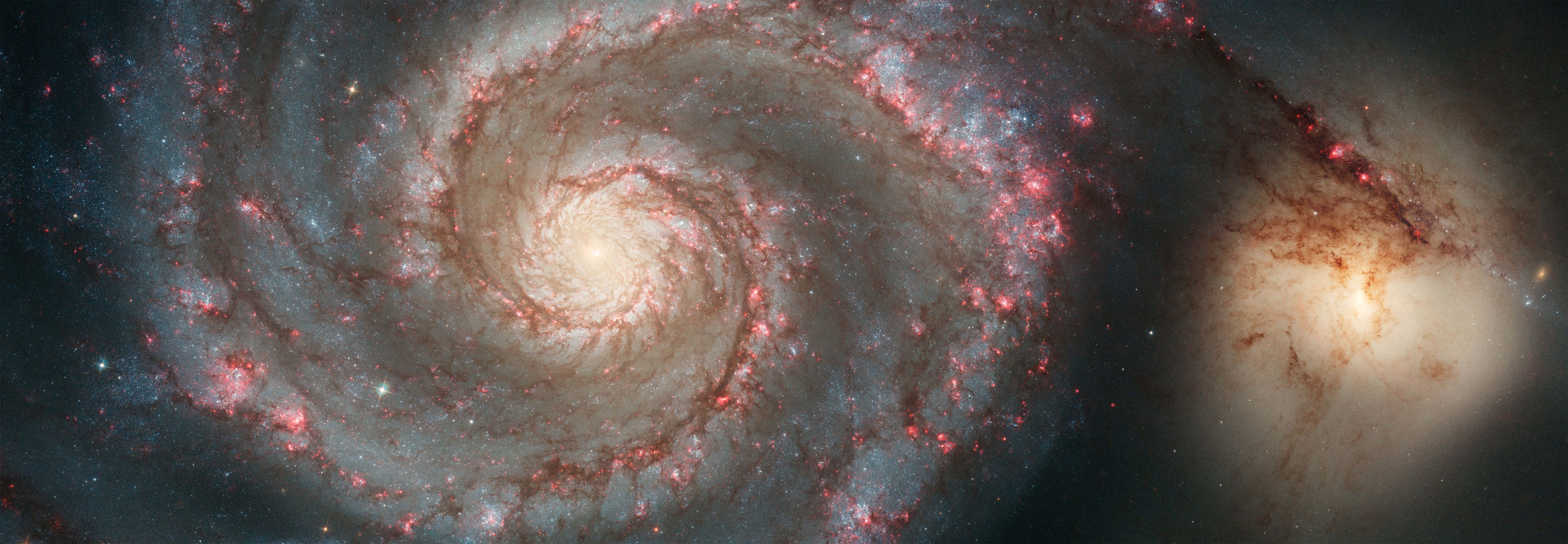 Whirlpool Galaxy, glowing red stars, cosmic dust, 5K Desktop Wallpaper
