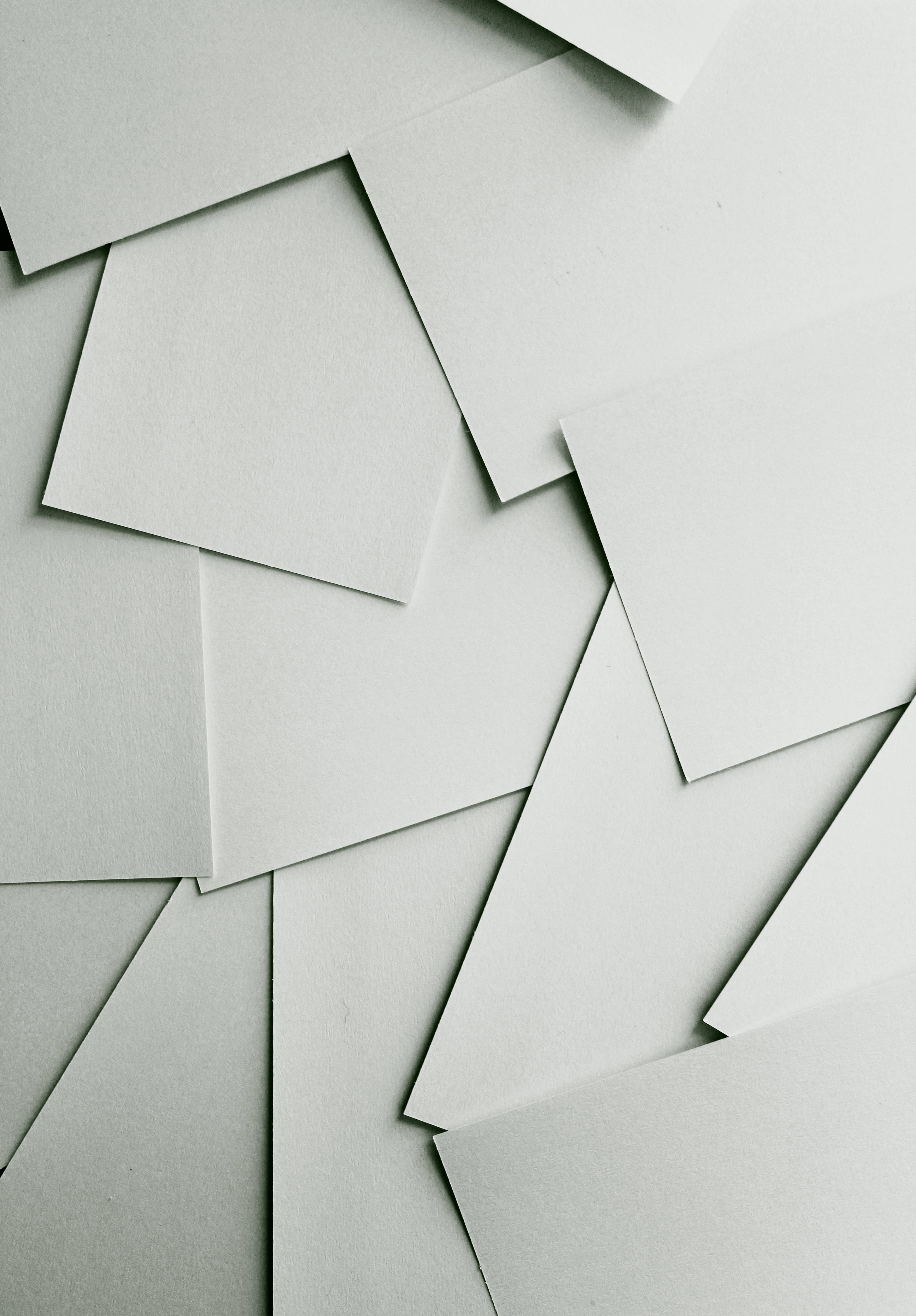 off-white paper sheets, overhead view, minimalist geometric pattern, 4K Phone Wallpaper